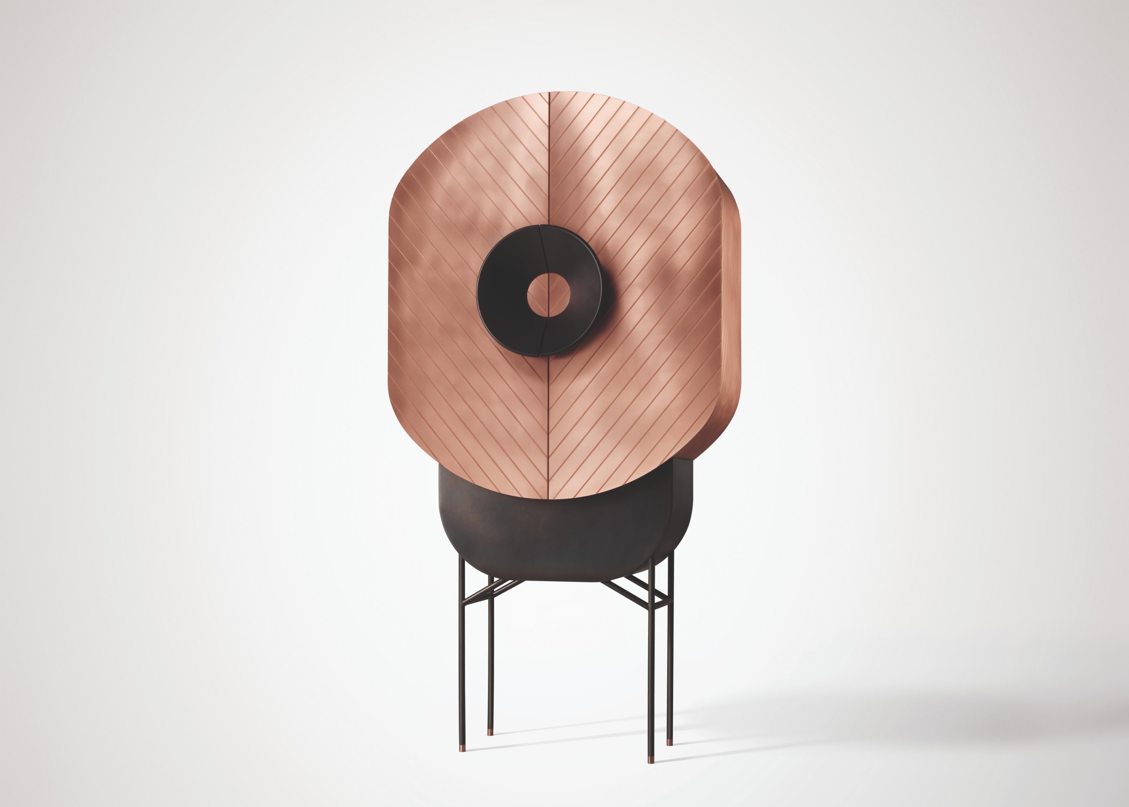 Mobiletto Polifemo di De Castelli
Dimensioni: L 85 x P 31 x H 165 cm
Materiali: Rame spazzolato, Legno, Gambe in acciaio inox DeLabré, Wood
È disponibile anche la versione in ottone. Contattaci per qualsiasi richiesta.

In equilibrio su gambe
