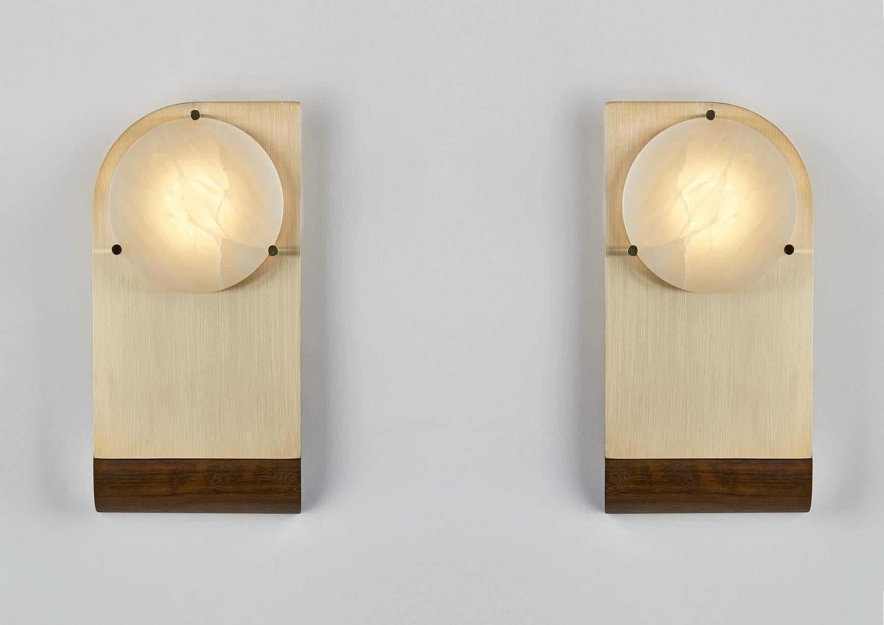 Polifemo Couple is a set of Sculptural Sconces suitable for illuminating and creating soft light spots on the sides of a mirror or in any situation that requires a symmetrical lighting composition.
The LED light can be supplied dimmable upon