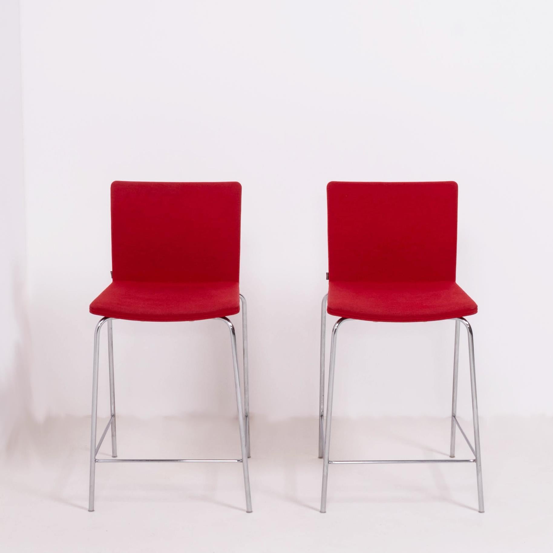 Originally designed by Mario Mazzer for Poliform in 2003, the Nex stool is the epitome of sleek and modern design.

Featuring a chromed metal frame with a foot rail, the seats are molded for comfort and upholstered in a bold red fabric.

This