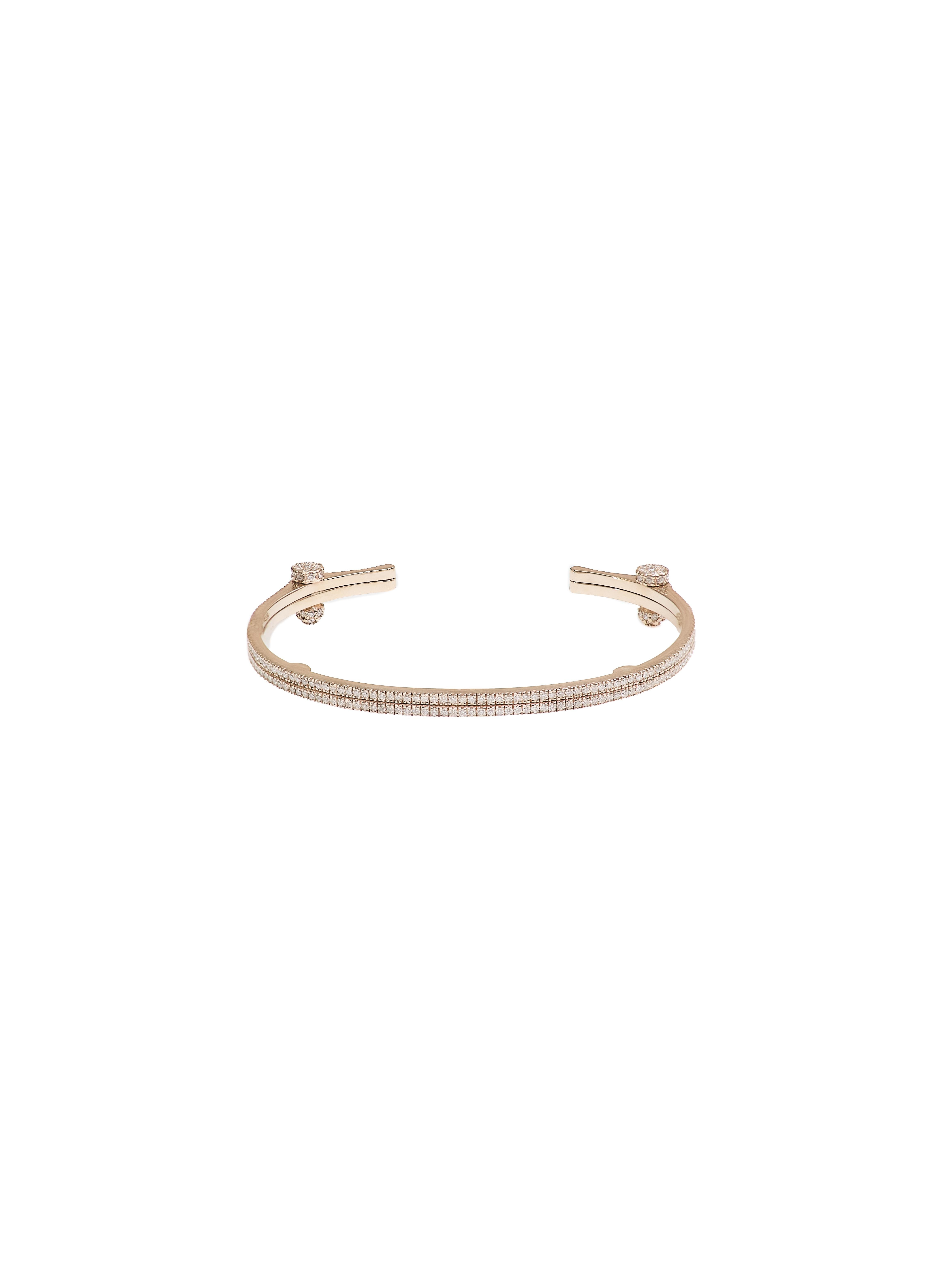 This bracelet from POLINA ELLIS' SYNDESIS collection consists of two full pave bands connected with full pave screws. 
Handcrafted in 18K raw white gold with 1,40ct white brilliant cut diamonds. The bracelet's perimeter is 15,5cm.