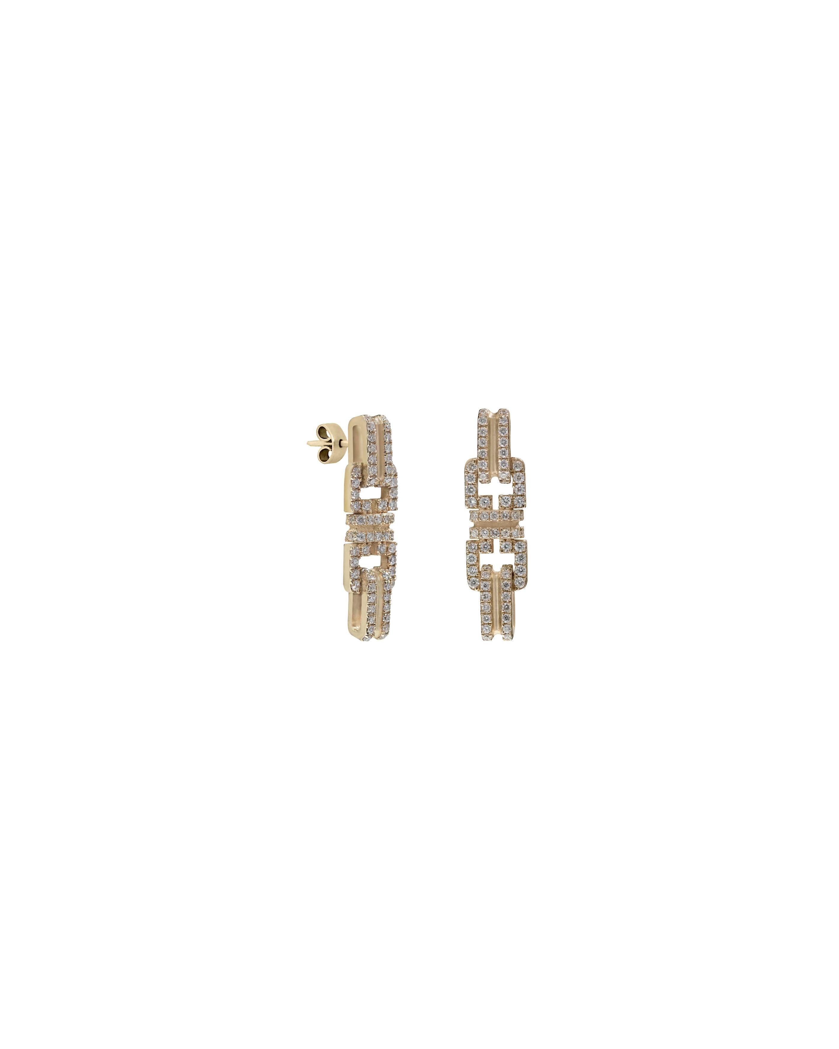 These earrings from POLINA ELLIS' ENOSIS collection are handcrafted in 18K raw white gold with 0,33ct white brilliant cut diamonds.
Length: 2,00cm
Width: 0,55cm