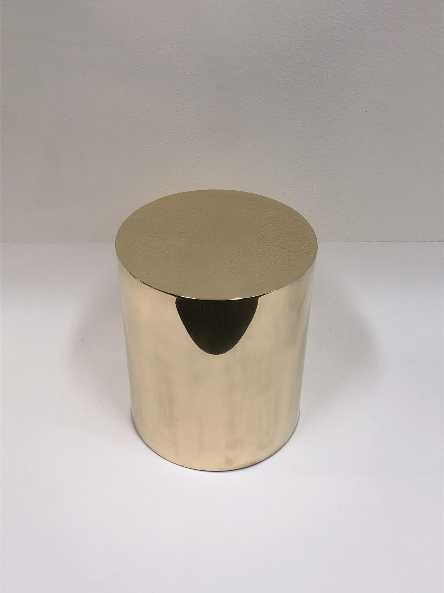 A beautiful polish brass CT drum by Brueton. This is constructed of solid brass polished into a seamless cylinder. 

Dimensions: 18” diameter 21.25” high.