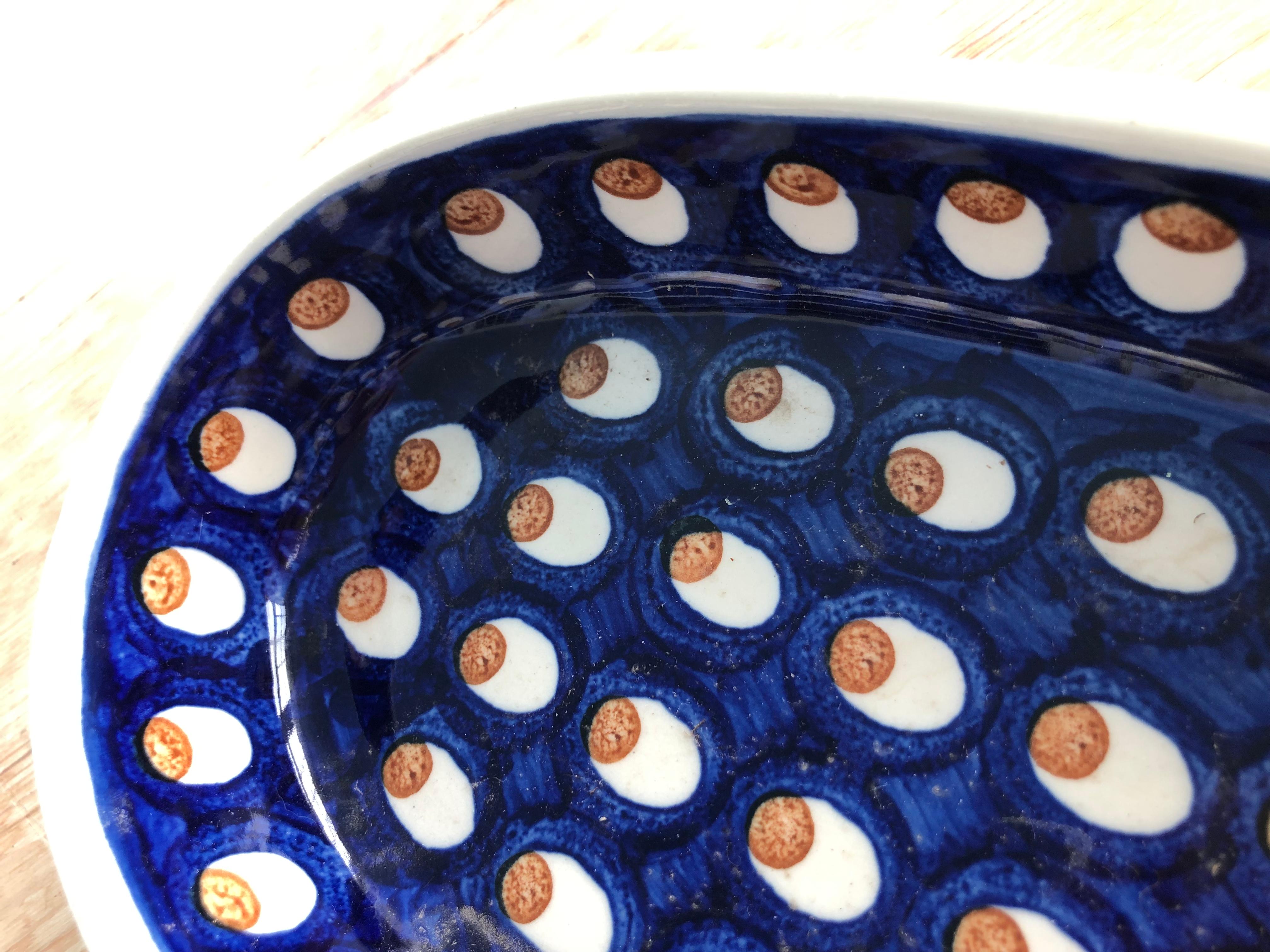 Hand painted Mid-Century Modern serving dish. Lovey blue background with red and white accents. Handmade in Poland. Retains original label. Stamped on underside.
