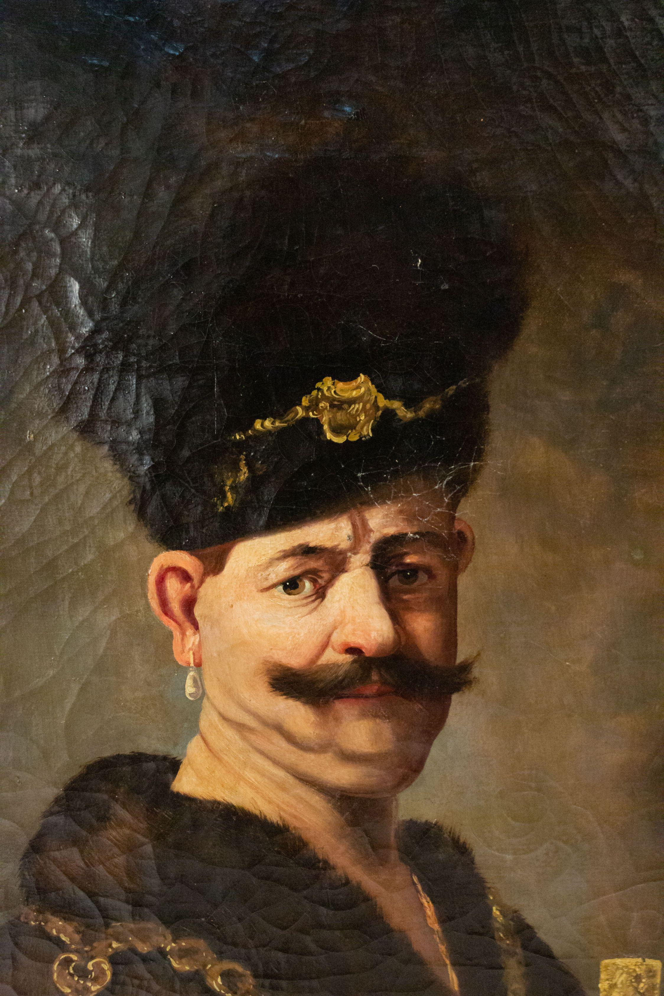 Ritratto ad olio con cornice dorata di un nobile (forse polacco) che indossa pellicce e orecchini di perla e regge lo scettro (copia del XIX secolo di un Rembrandt)