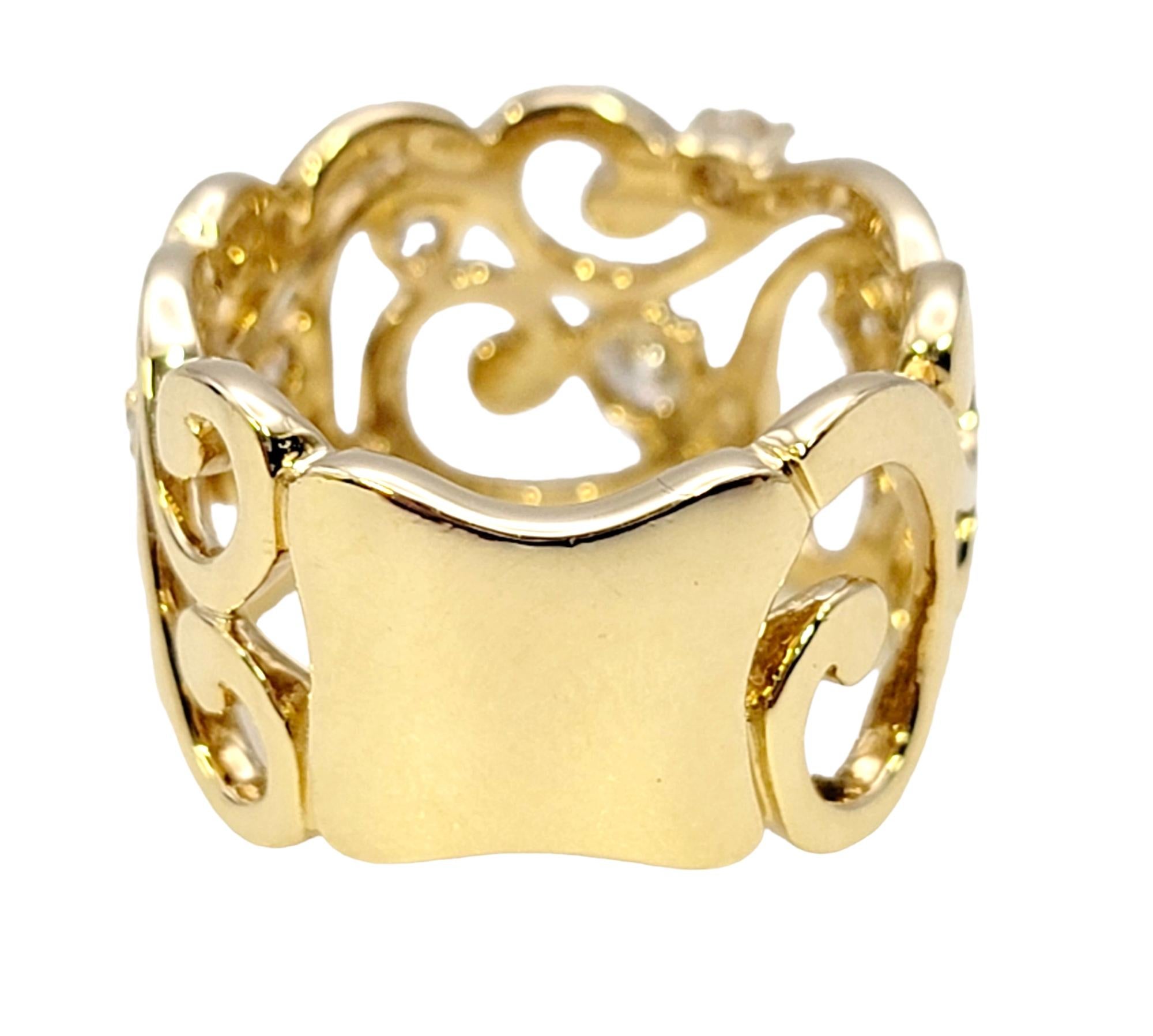 Women's Polished 14 Karat Yellow Gold Scroll Motif Extra Wide Band Ring with Diamonds For Sale