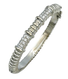 Polished 18 Karat White Gold Ribbed Bangle Bracelet with Round Diamonds