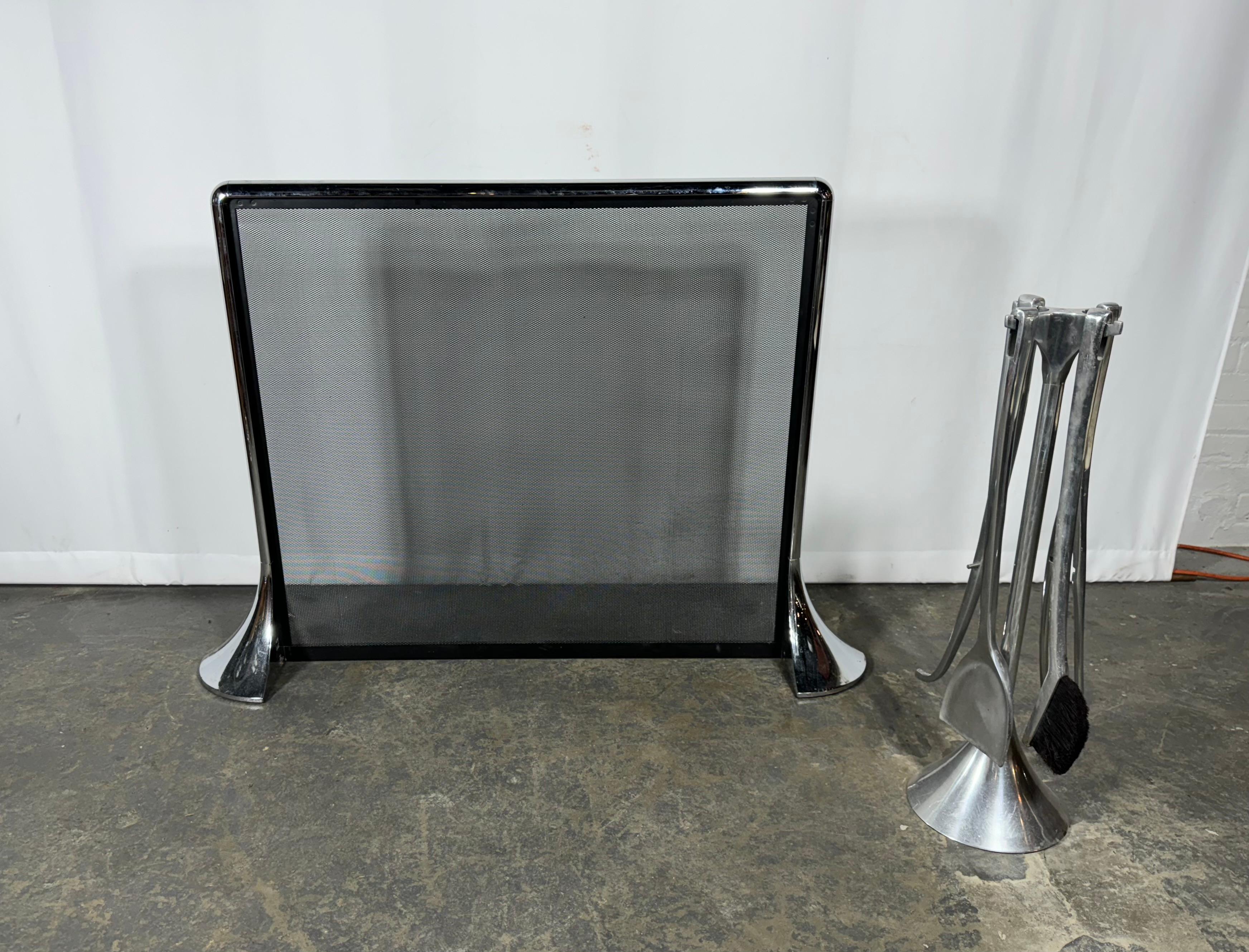 Seldom seen.. “Vesta” vintage fireplace screen by designer Nick Gillissie for Umbra. Polished aluminum frame with mesh screen. Matching set of fireplace tools 