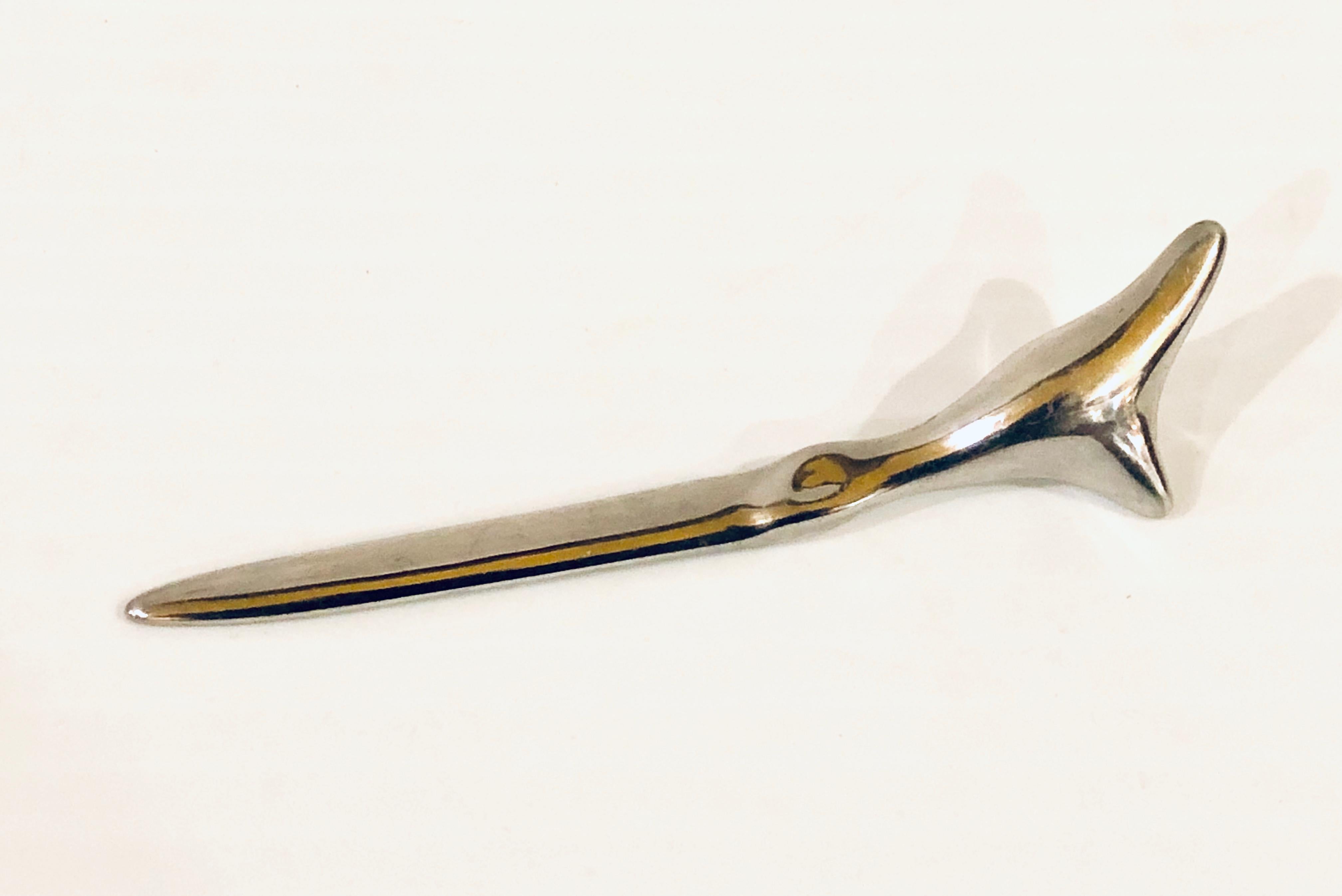 Polished aluminum letter opener seal sculpture by Hosleton signed, and numbered made in Canada circa 1970s.