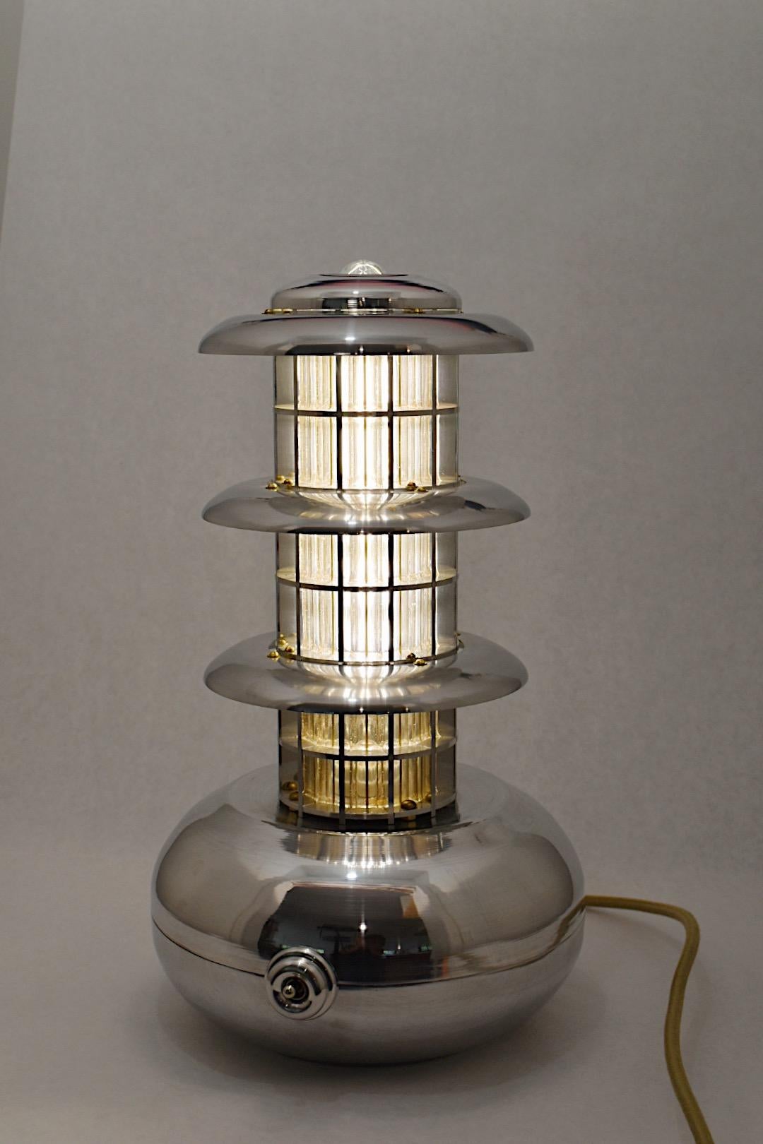 Pagoda Lamp Model 1 is one half of a pair of lamps designed and fabricated during 2021. The inspiration is the Peace Pagoda in San Francisco's Japantown neighborhood designed by Yoshiro Taniguchi, constructed in the 1960s. 
The center column of the