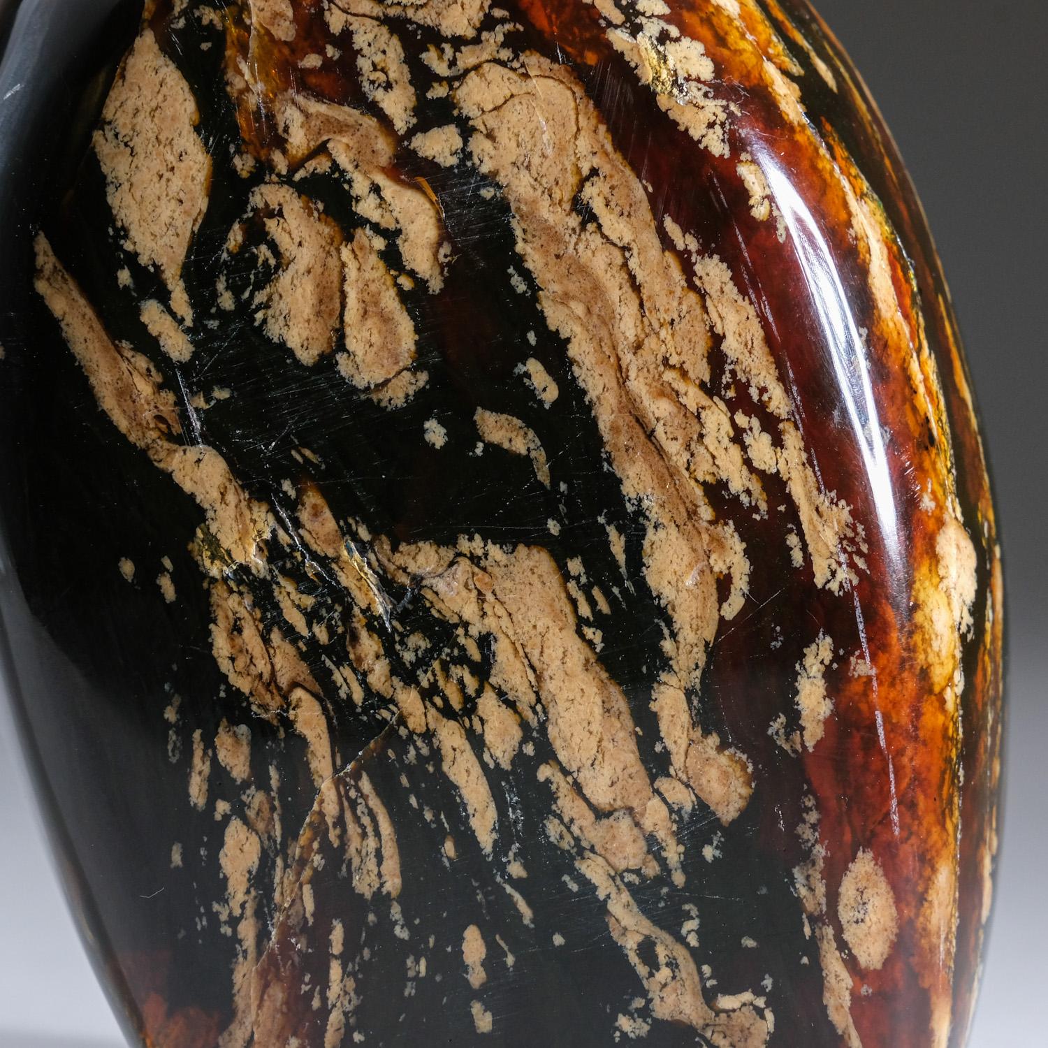 AA quality polished Indonesian zebra amber freeform. Amber is a powerful cleanser and healer of the mind, body, and spirit. It absorbs pain and negative energy, helping to alleviate stress.

Blue Amber has a stunning color in UV light and is