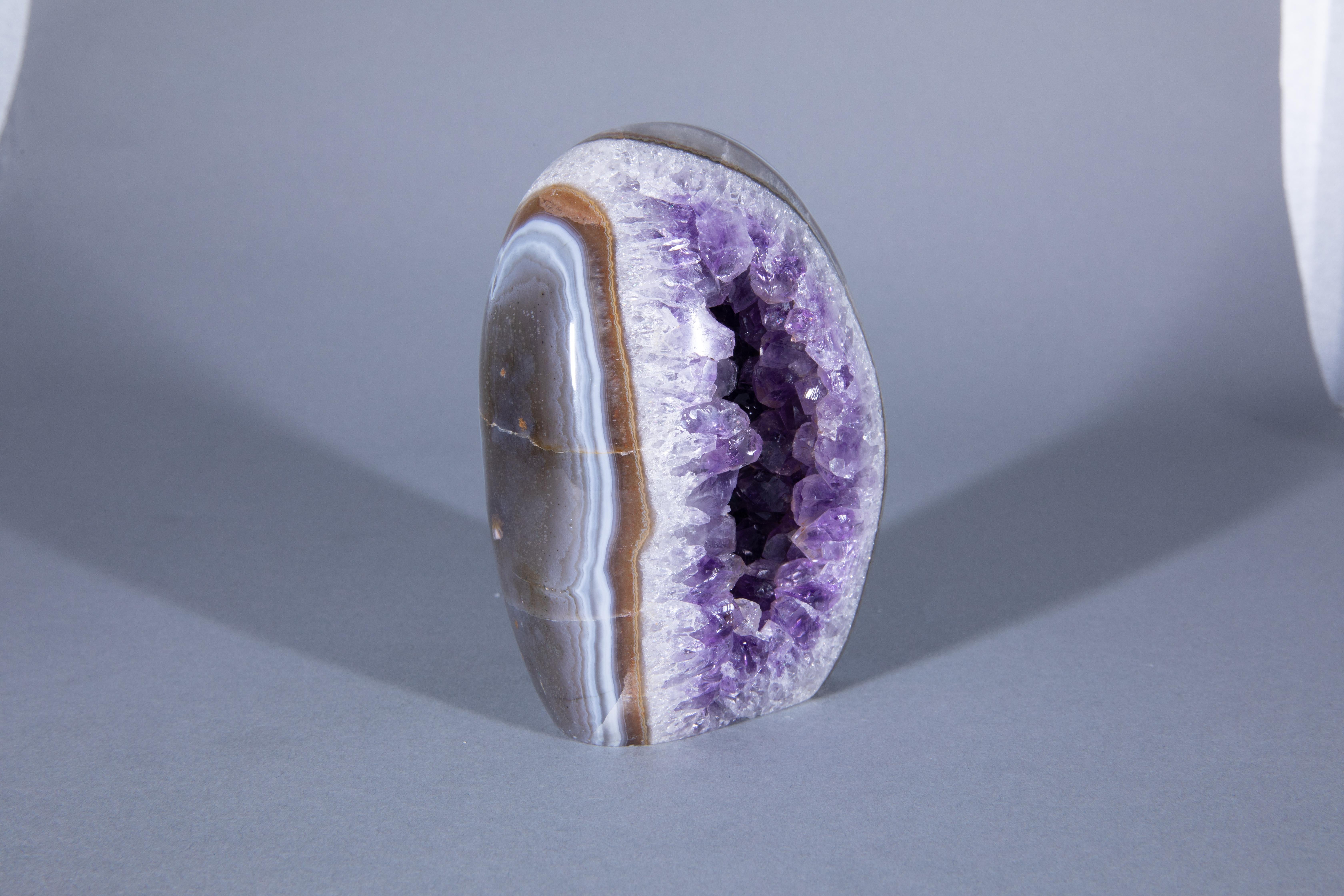 Uruguayan Polished Amethyst Egg Geode Surrounded by Agate and Quartz For Sale