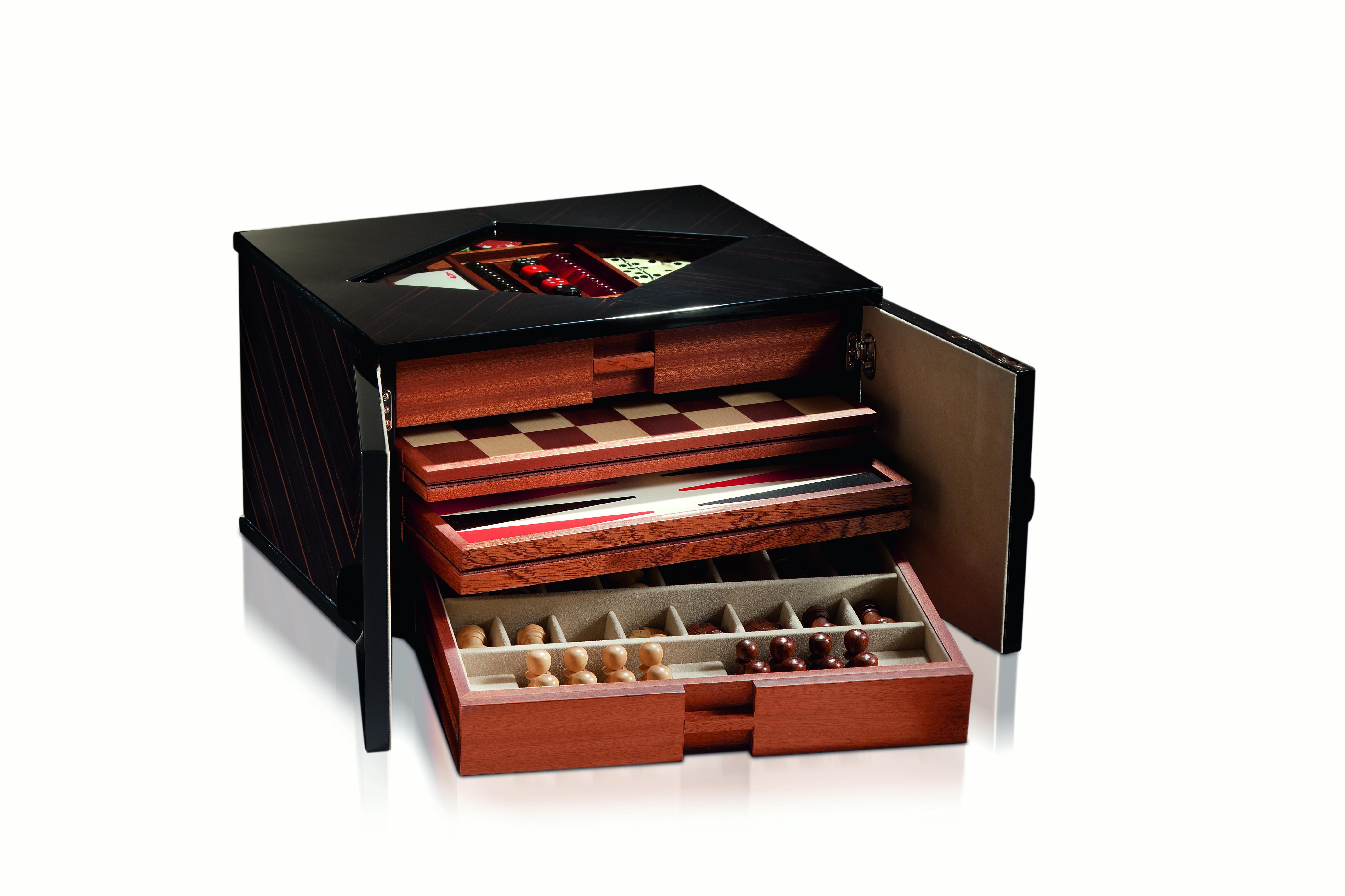 On rainy days or a night with friends, bring Las Vegas to your living room. Our multi-game set features: chess with 8.3 Staunton chessmen, checkers, backgammon, dominoes, cards, poker dice and 170 poker chips. Black polished wood meets a nickel