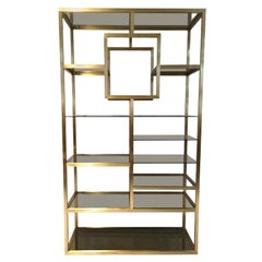 Polished Brass and Glass Shelving Attributed to Romeo Rega