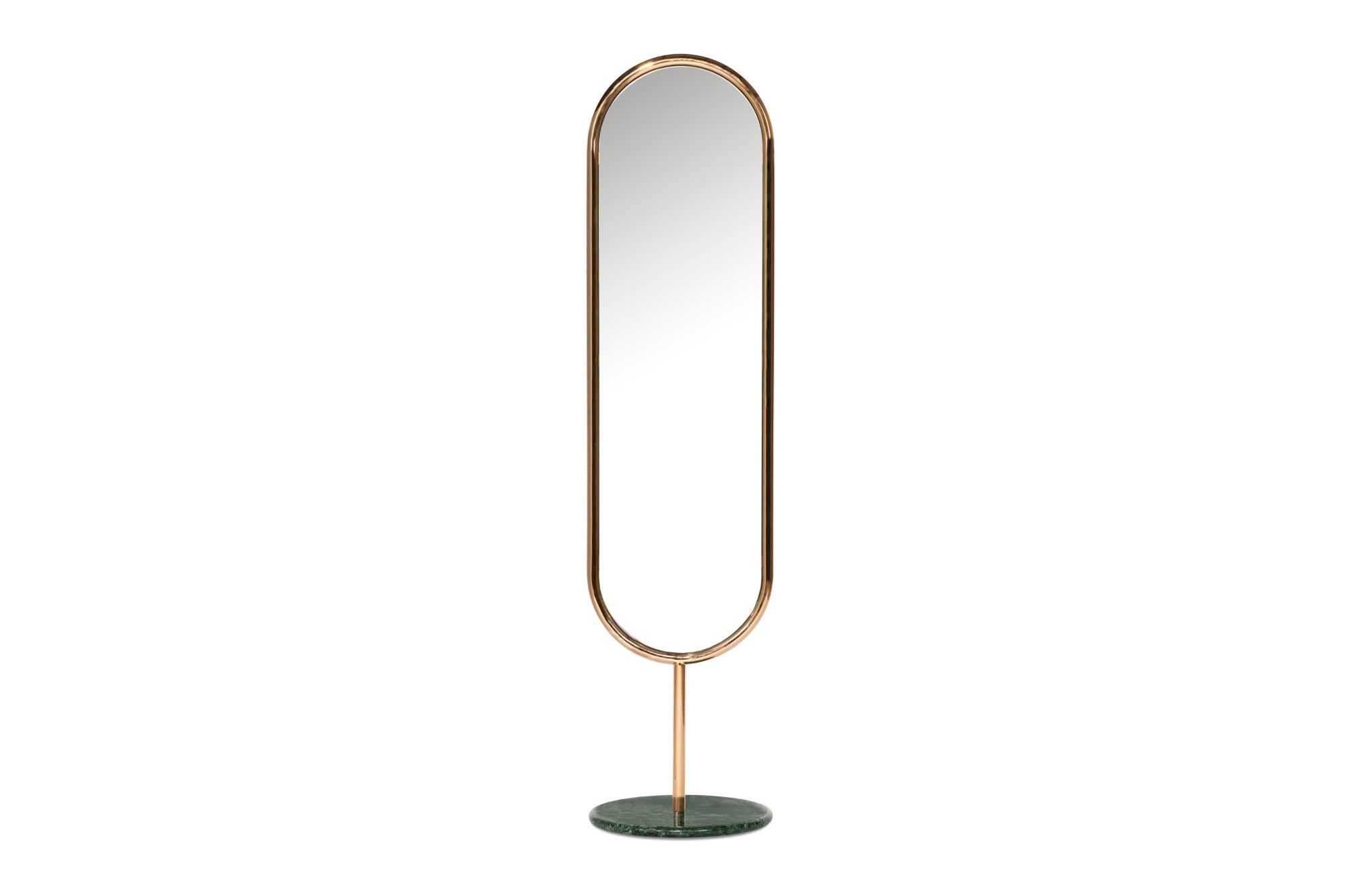 Polished brass and Green Marble Marshmallow floor mirror, Royal Stranger
Dimensions: 183 x 44 x 44 cm
Materials: Polished brass structure standing on the top of a Guatemala Green marble.

Available in brass, stainless steel, and copper with polished