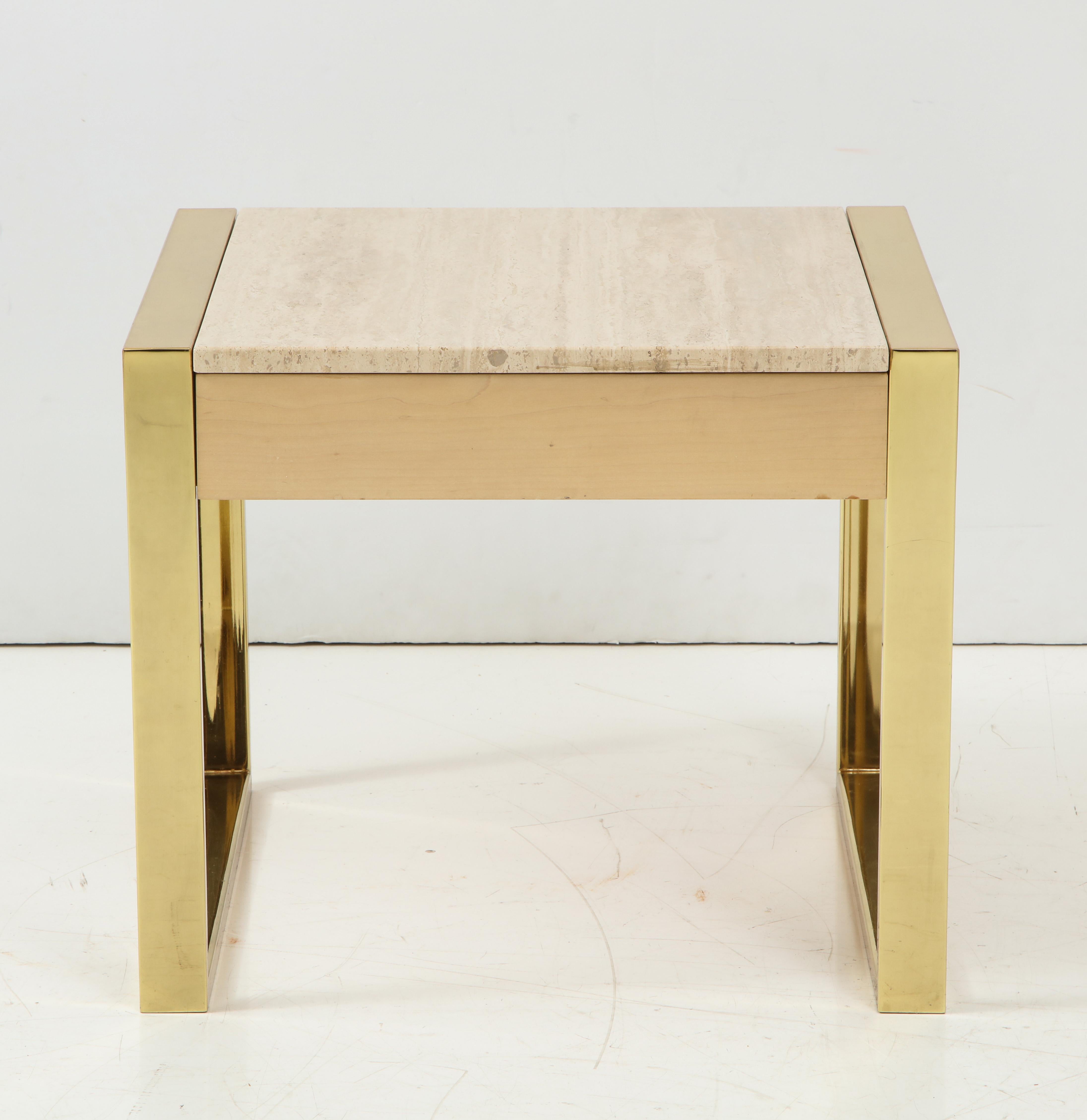 Polished brass and Travertine side table with a single drawer
makes this a versatile table or nightstand.