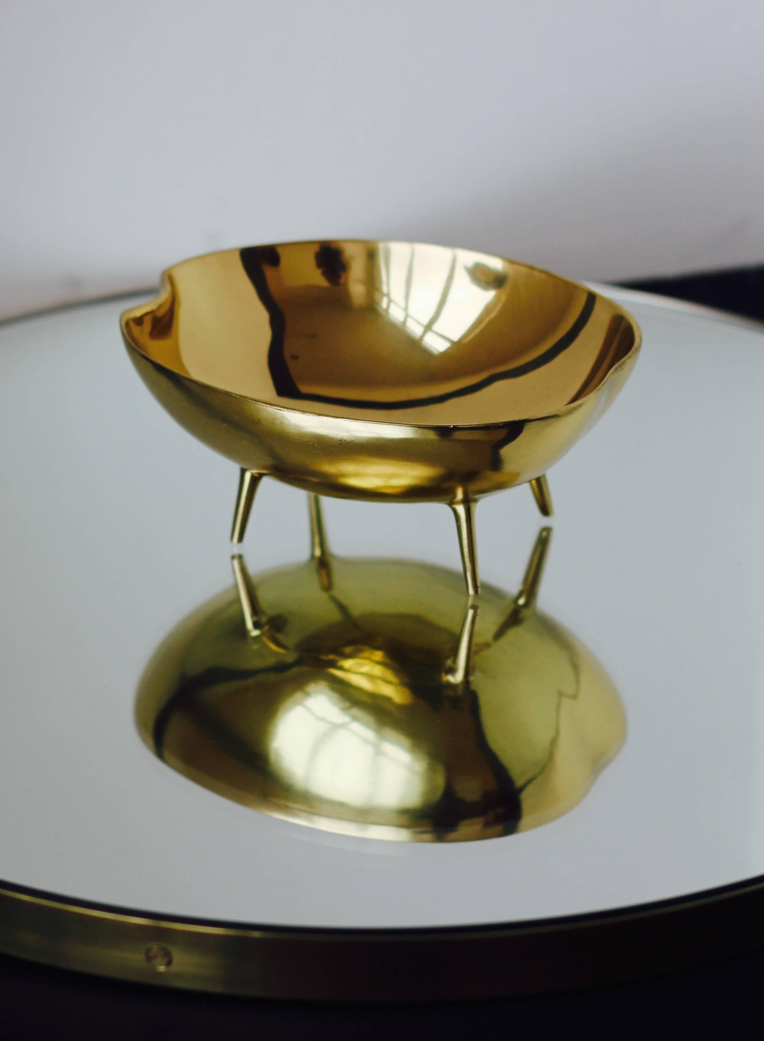 Charming and unusual handmade polished cast brass bowl.

Each of those original and elegant bowls are handmade individually. Cast using very traditional techniques.

Slight variations in polished finishes, patterns and sizes are characteristics