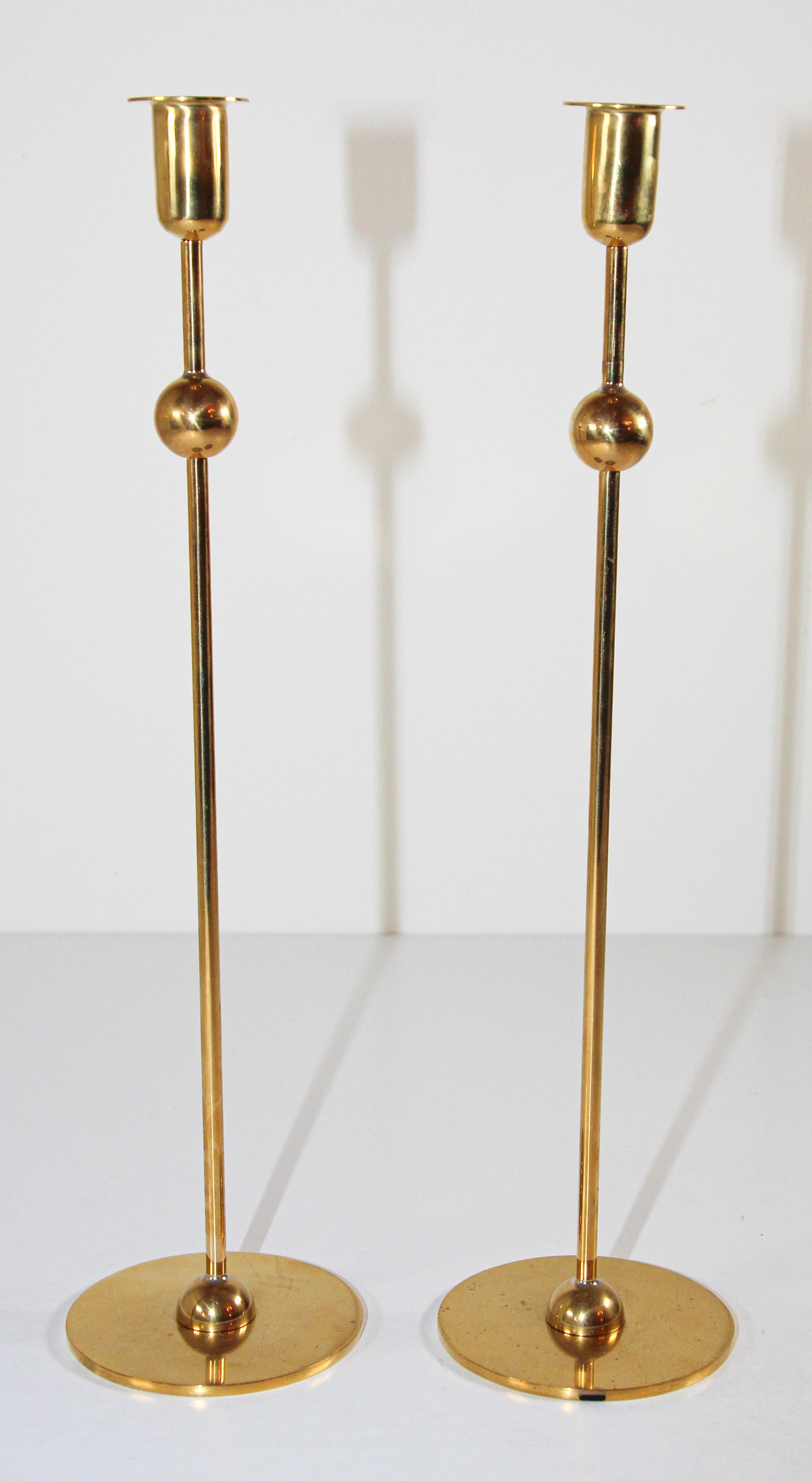 Polished brass candle holder globe by Estrid Ericson for Svenskt Tenn Sweden
The light at the dining table was a matter that lay close to Estrid Ericson’s heart. During a radio interview in 1951 she commented that candle holders should be high,