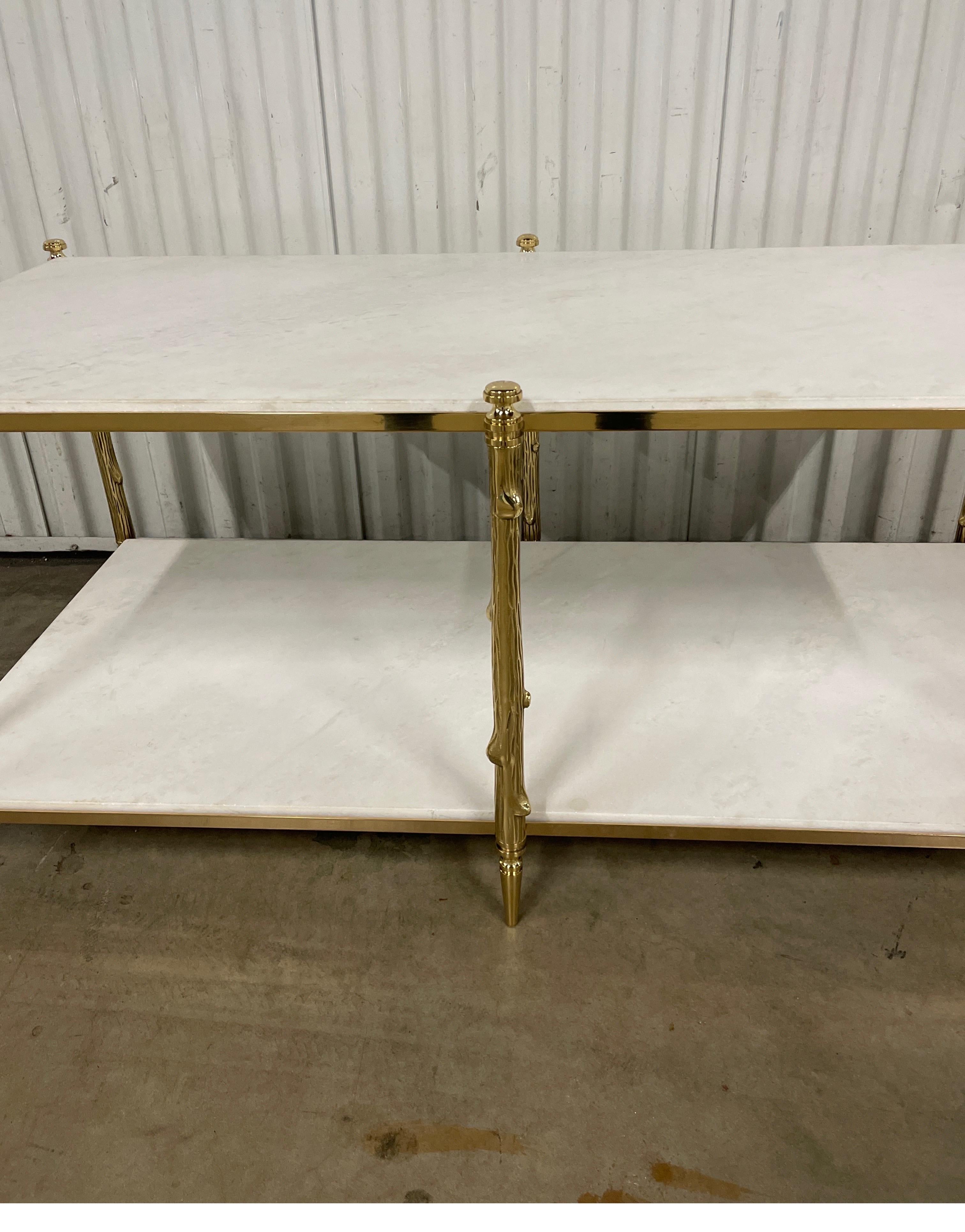 Brass Faux Bois two tiered coffee / cocktail table with honed white marble.
A classic and timeless beauty.