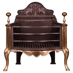 Cesta de fuego de latón pulido y hierro
