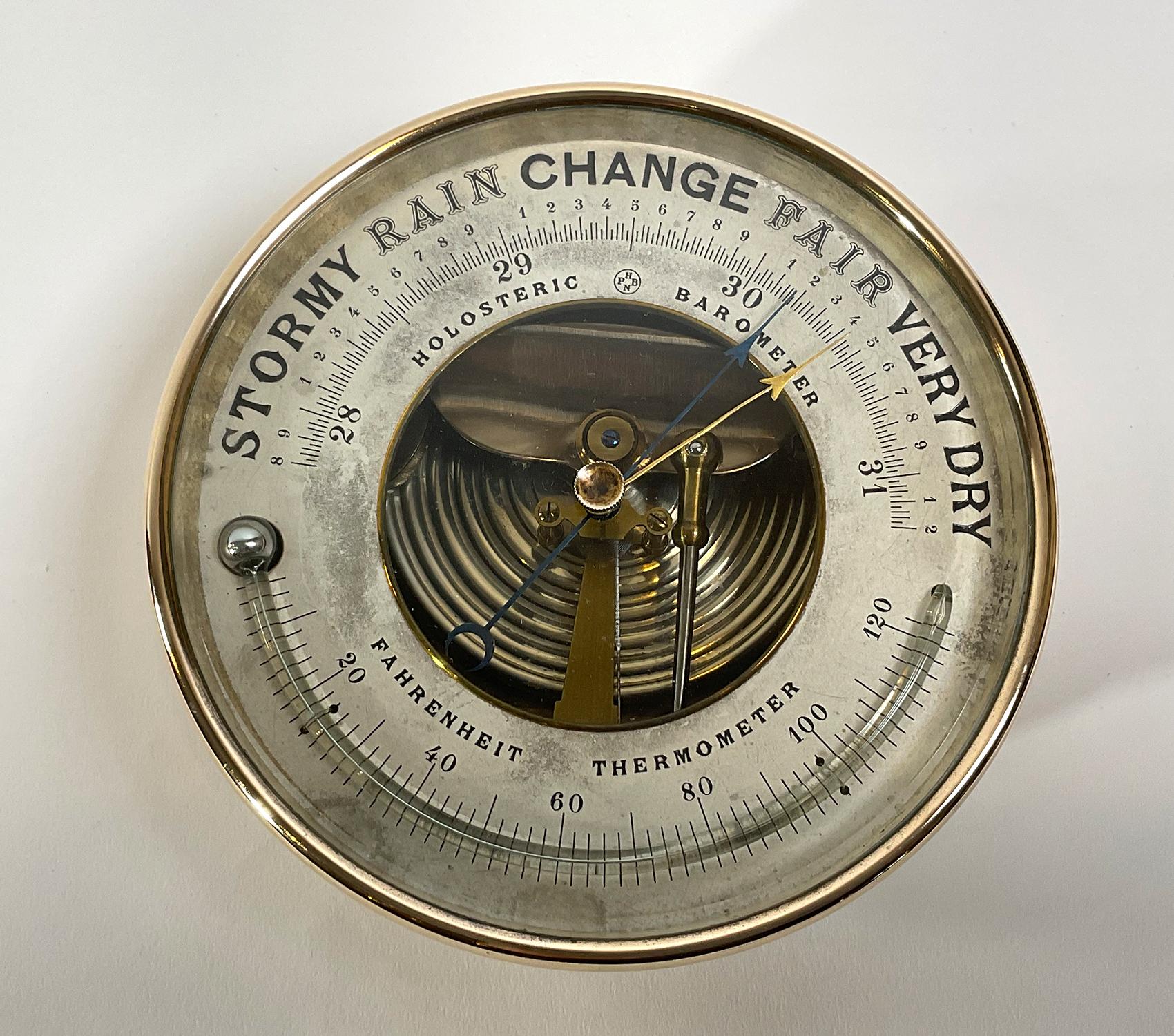 Antique French brass Halosteric barometer. With logo HNPB. Polished brass case. Beveled glass. Hanging loop. French made. Circa 1940.