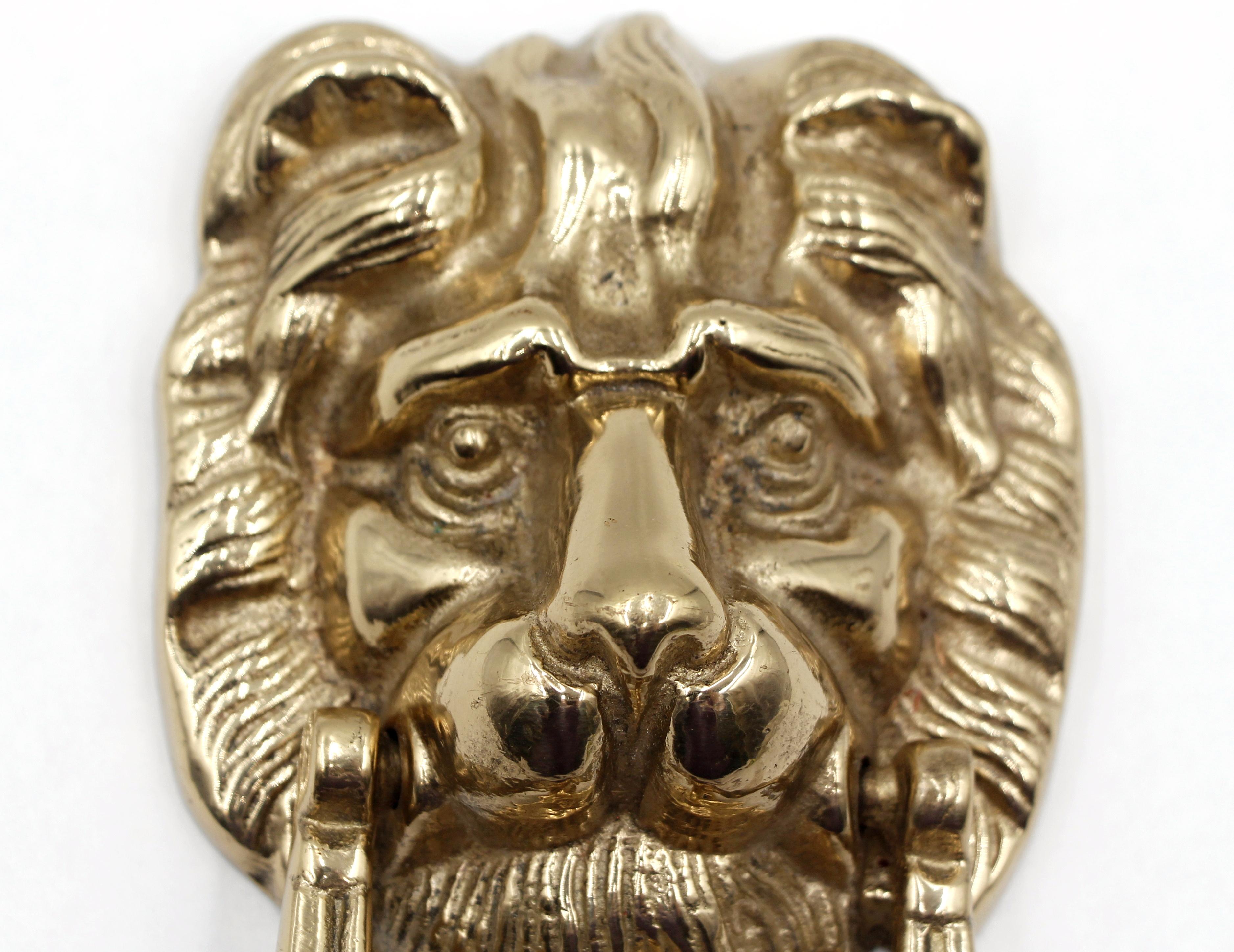 Solid brass door knocker featuring a lion, often used for its symbolic representation of strength, pride, and protection. The original mounting screws are not available. Good condition with surface wear from prior use. One available. Please note,