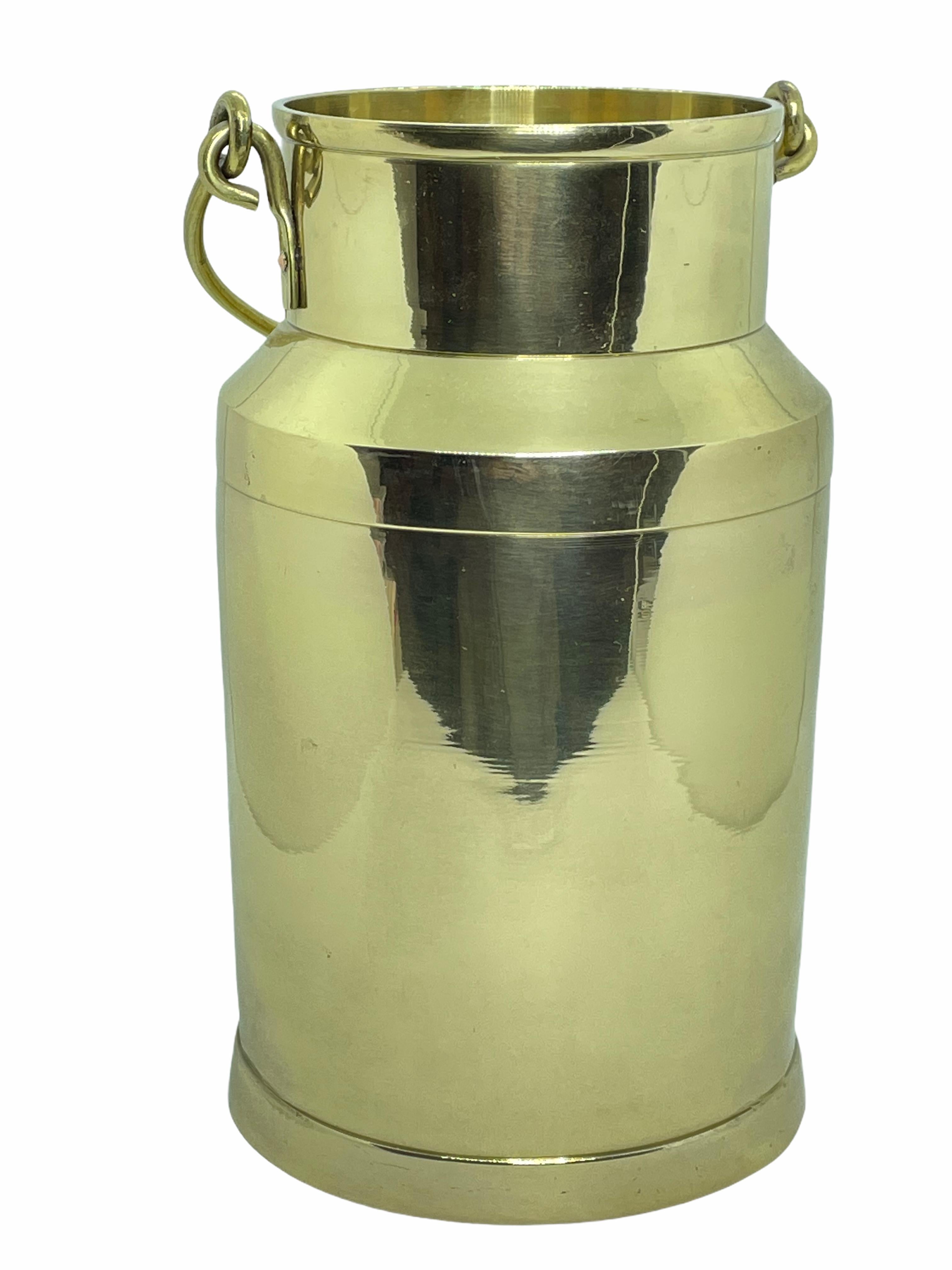 Beautiful polished brass vase. In the shape of a milk can. A beautiful piece for any room. Diameter on top is approx. 3.38
