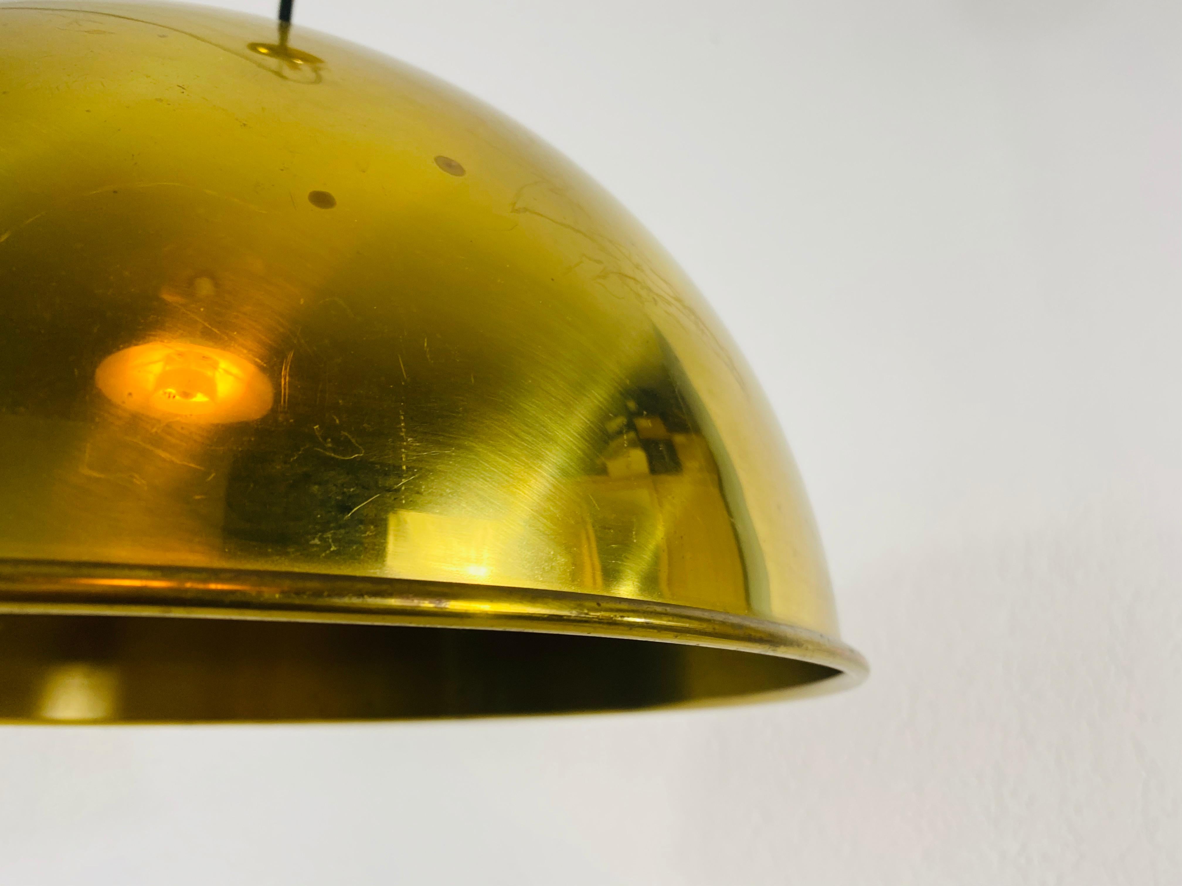 Polished Brass Pendant Lamp by Florian Schulz, 1970s, Germany For Sale 1