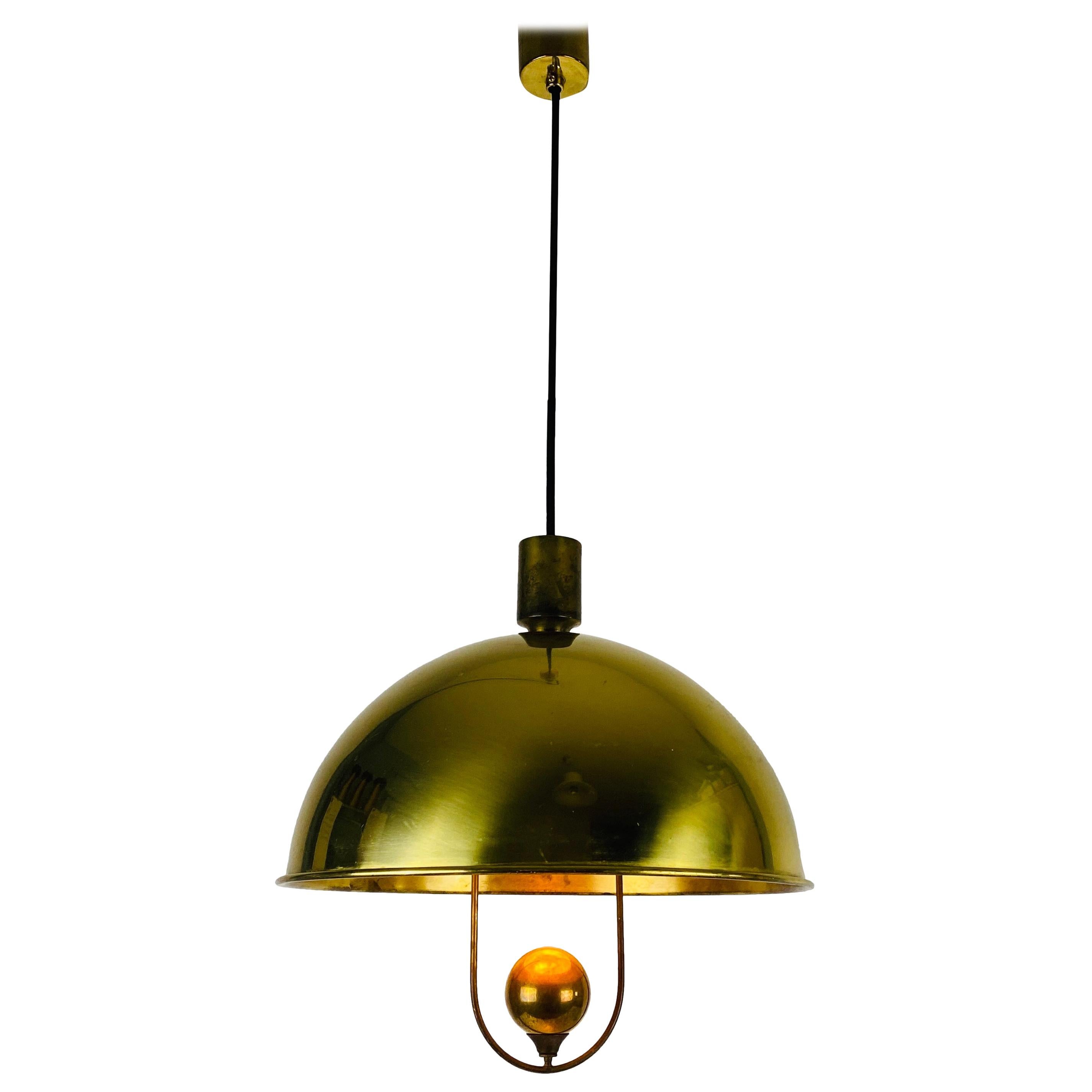 Polished Brass Pendant Lamp by Florian Schulz, 1970s, Germany For Sale