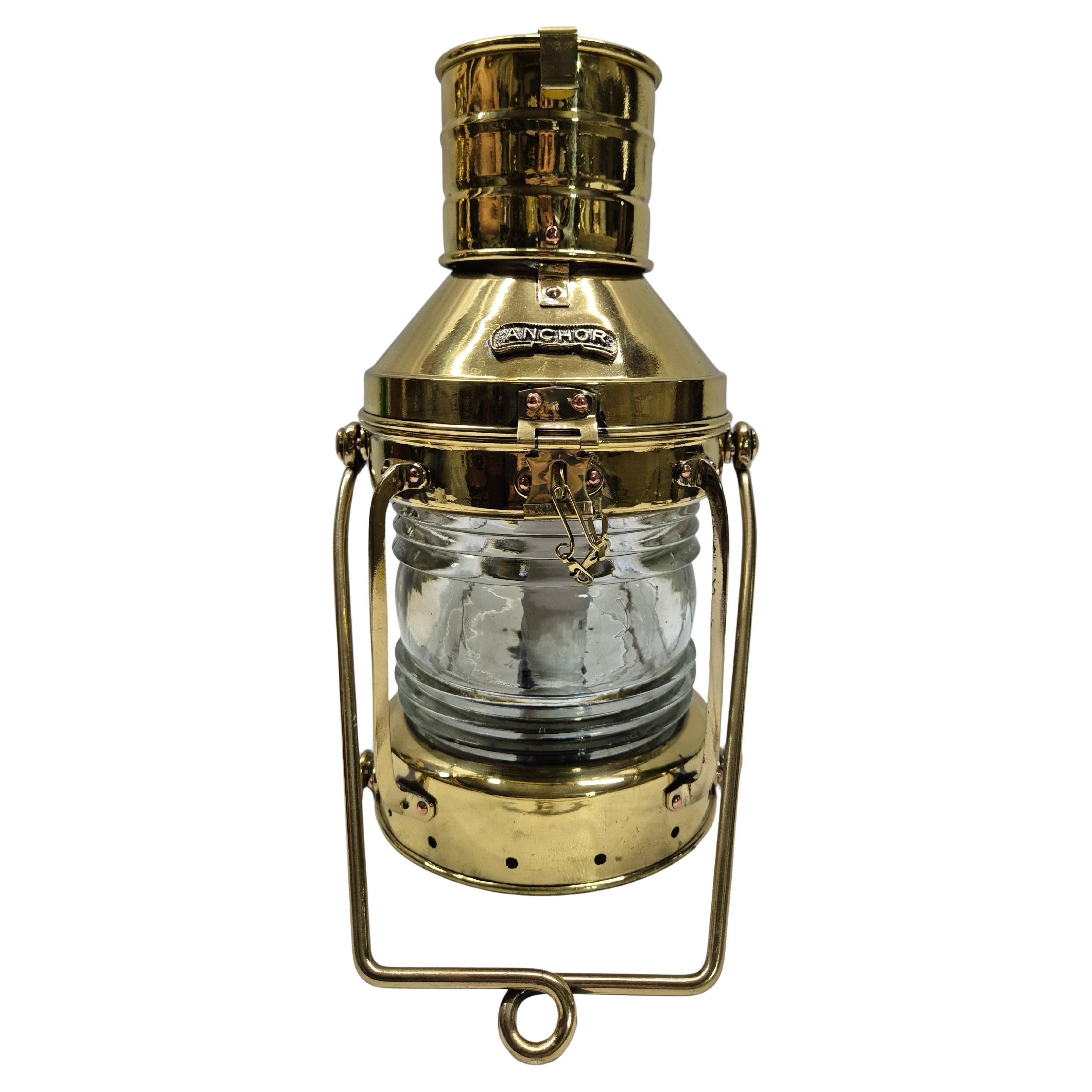 Lanterna ad ancora in ottone lucido con lente Fresnel