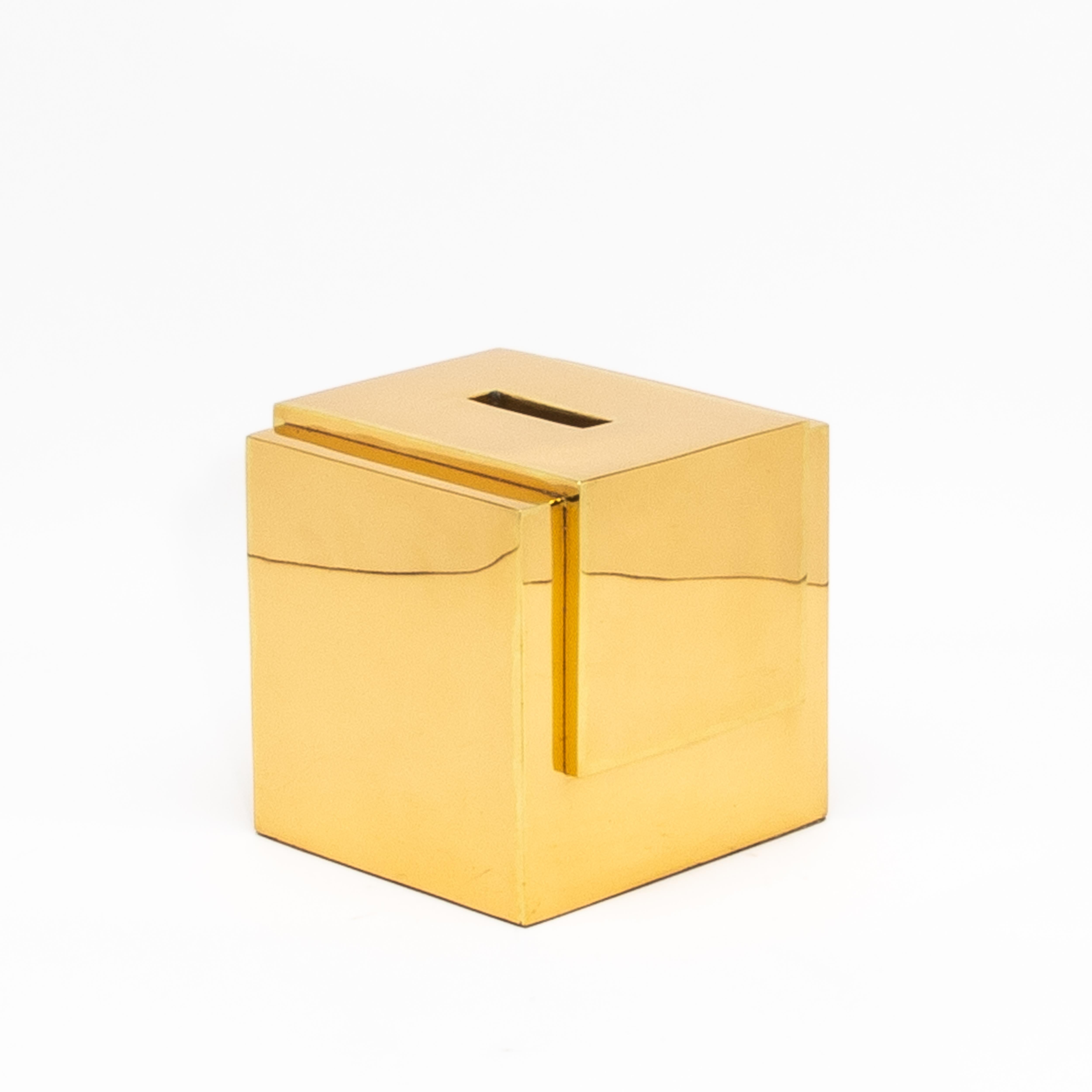 Elevate the everyday with this exquisite Polished Brass Tissue Box by R&Y Augousti, a testament to unparalleled craftsmanship and luxurious materials. Each piece is meticulously hand-crafted from solid brass, polished to a high sheen that radiates
