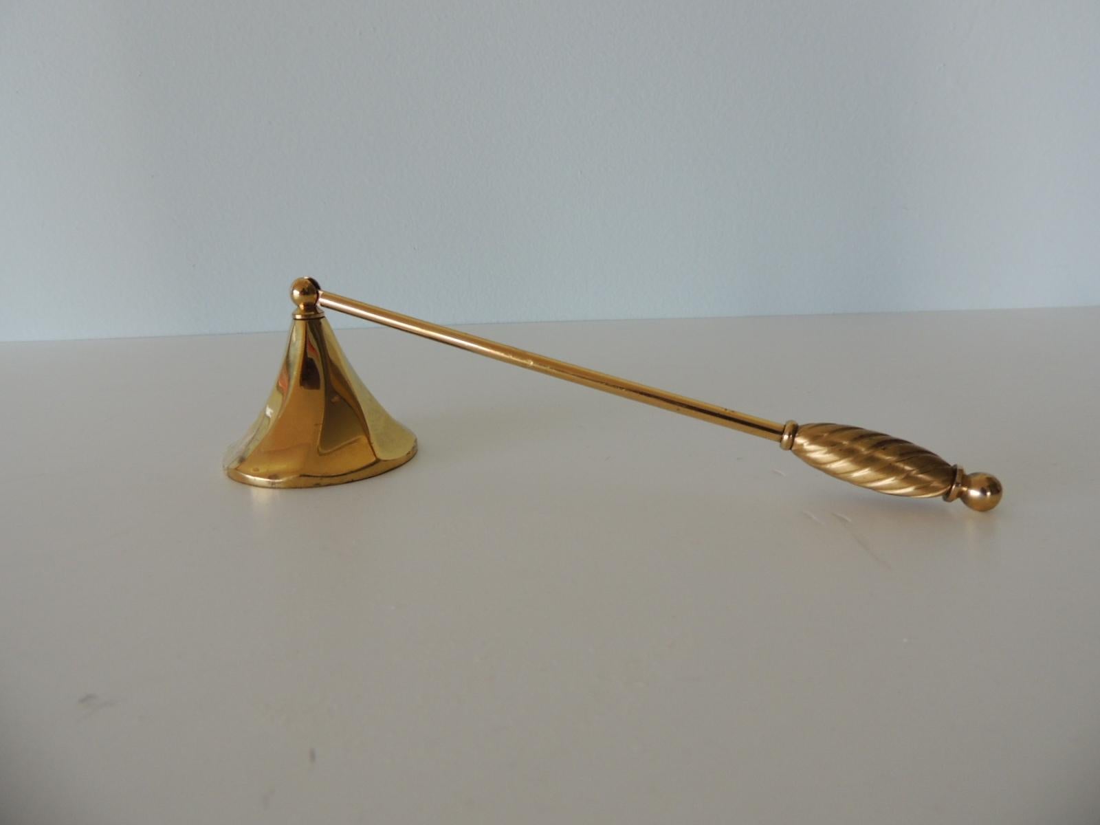 Polished brass trumpet shape candle snuffer 
Size: 9
