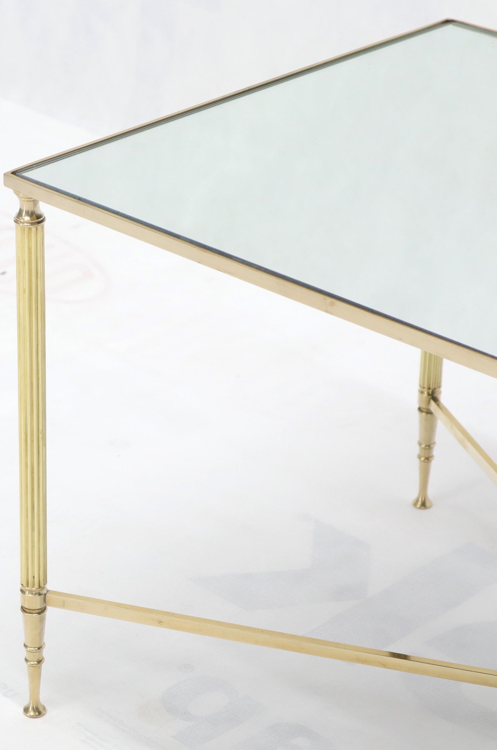 Italian Polished Brass X-Stretcher Base Fluted Legs Mirrored Glass Top Coffee Table For Sale