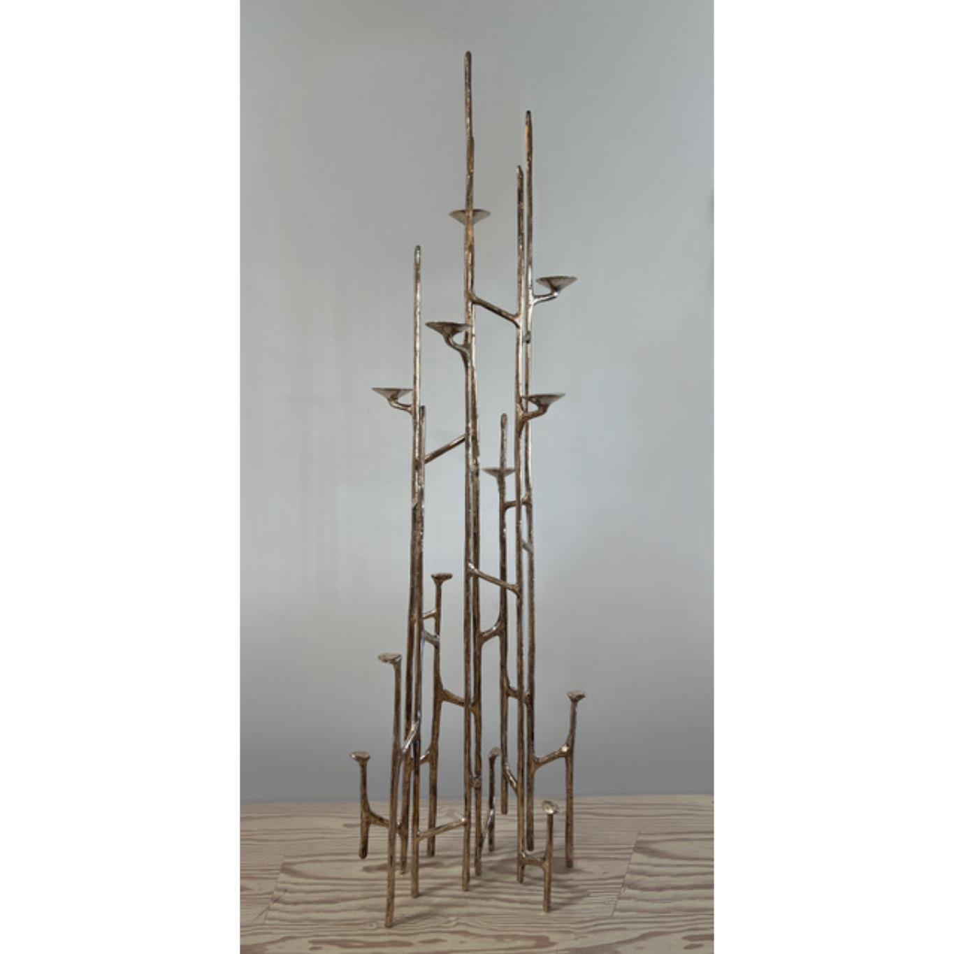 Polished bronze floor candelabra by Mary Brogger.
Dimensions: W 33 cm x D 66 cm x H 200 cm.
Materials: Polished bronze.

Mary Brogger is an internationally recognized artist whose diverse practice includes sculpture and site-responsive
