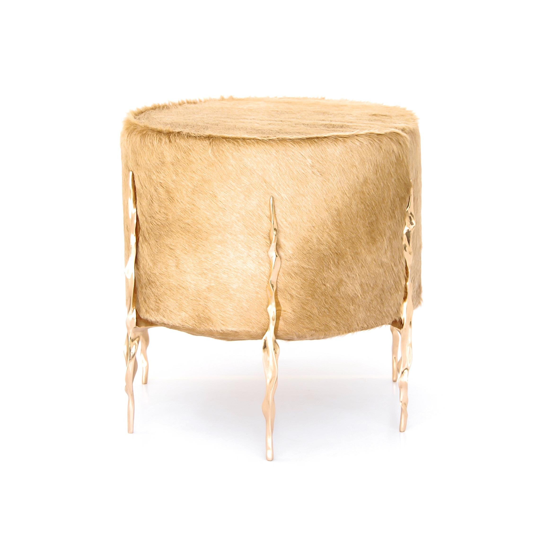 Polished bronze ottoman by Fakasaka Design.
Dimensions: W 45 cm, D 45 cm, H 45 cm.
Materials: polished bronze, leather.

 FAKASAKA is a design company focused on production of high-end furniture, lighting, decorative objects, jewels, and