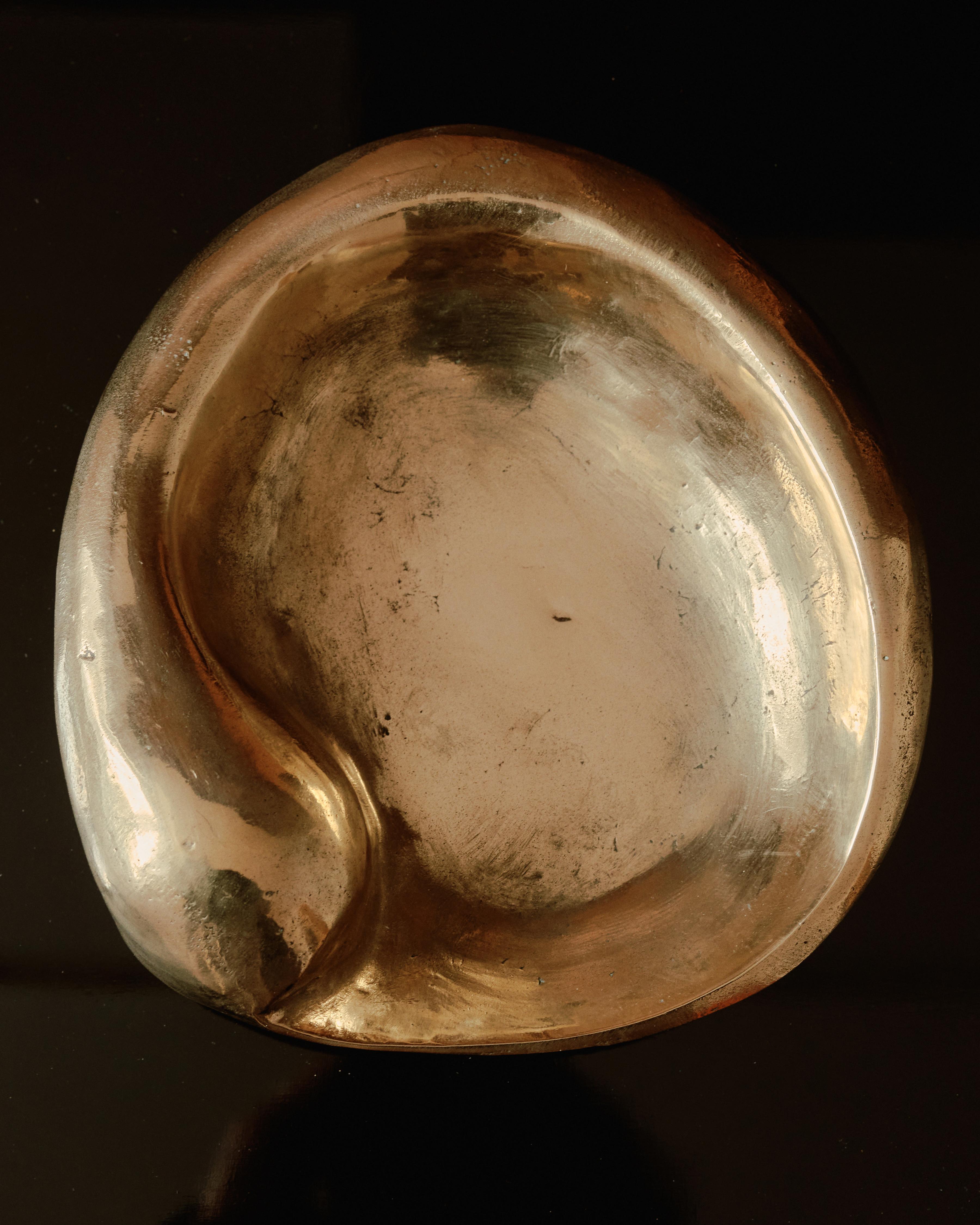 Sculptural, solid bronze bowl by artist and designer Simone Bodmer-Turner, entitled 