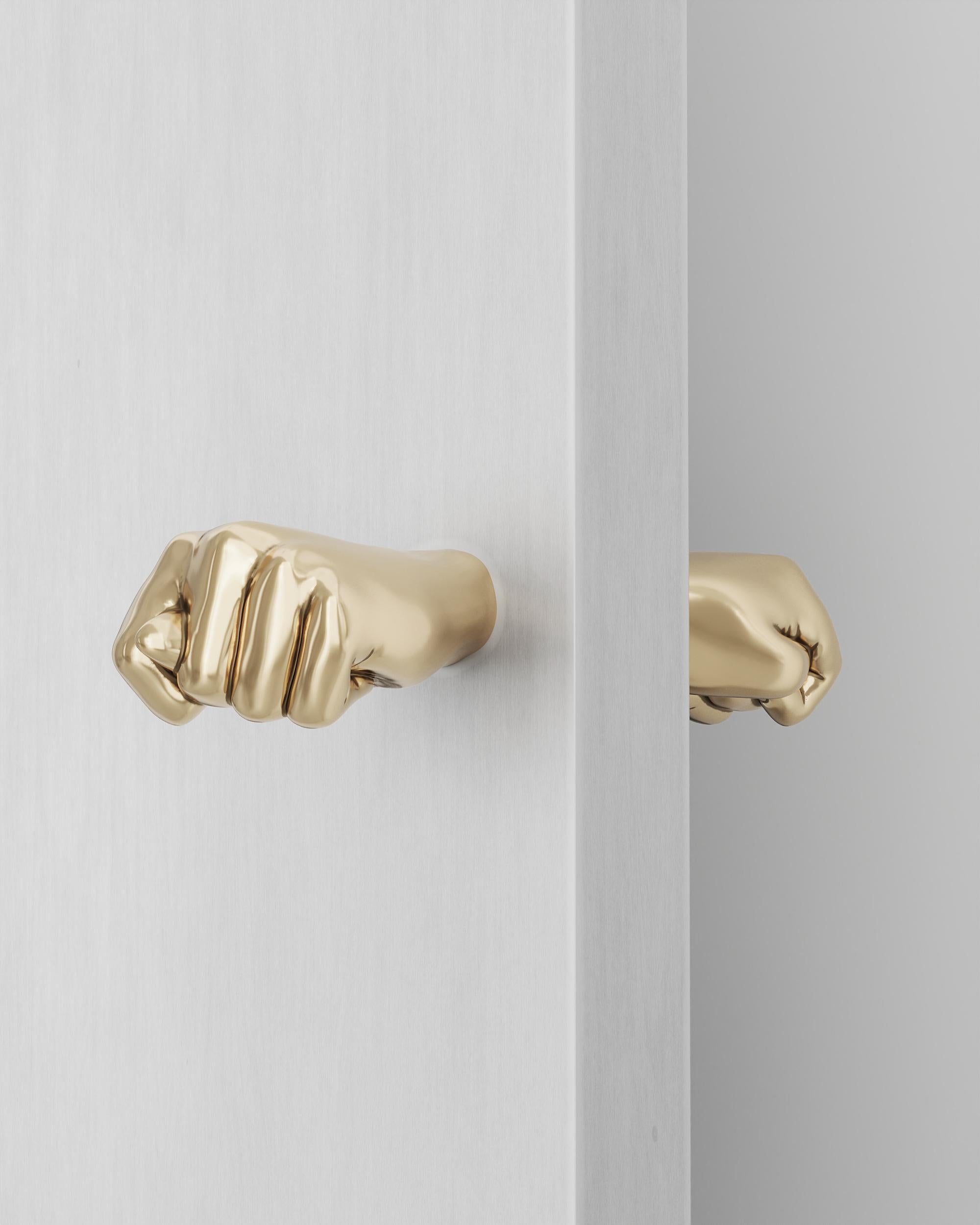 Polished Cast Brass Figa Dupla Door Hanger by Studio Orth
Dimensions: W 13 x D 8 x H 6 cm
Materials: Cast metal.
Finishes: Polished Cast Brass or Polished Cast Aluminum

About: 
Studio Orth is a multidisciplinary furniture and interior design firm,