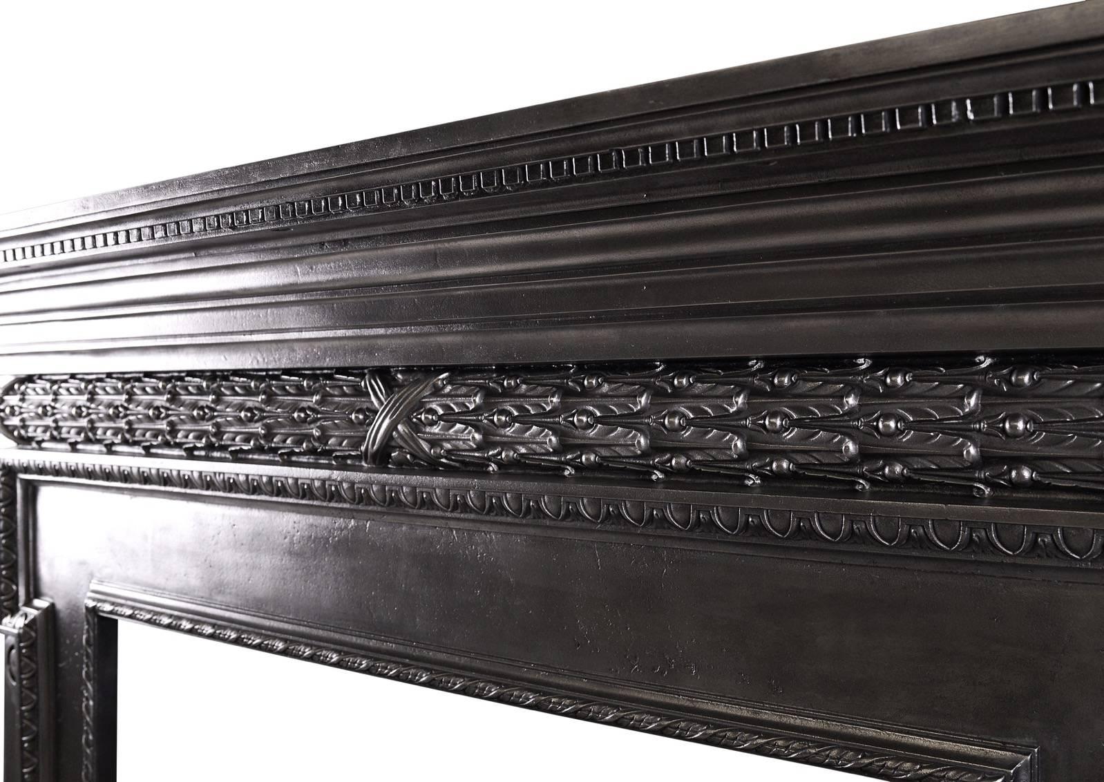 English Polished Cast Iron Fireplace in the Mid Georgian Style For Sale