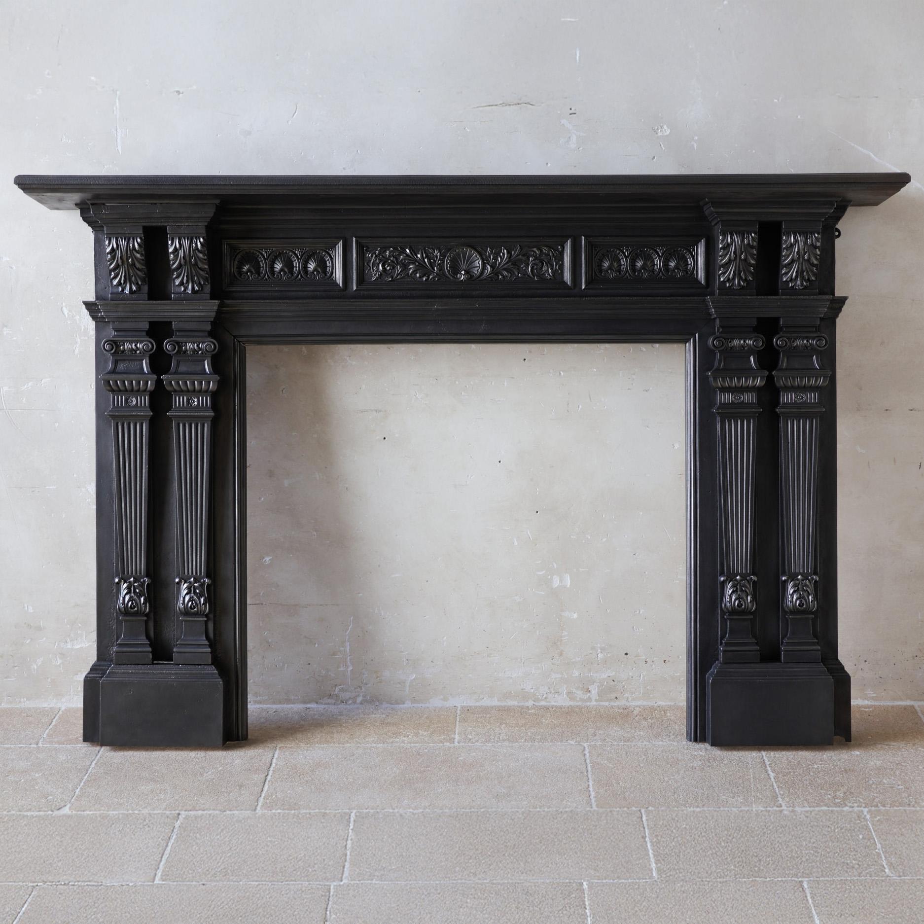 This stylish antique fireplace mantel - fire surround, crafted from solid polished cast iron, combines clean lines with rich, classic ornaments, exuding a distinct Peaky Blinders style. The front features three panels, decorated with stylized shell