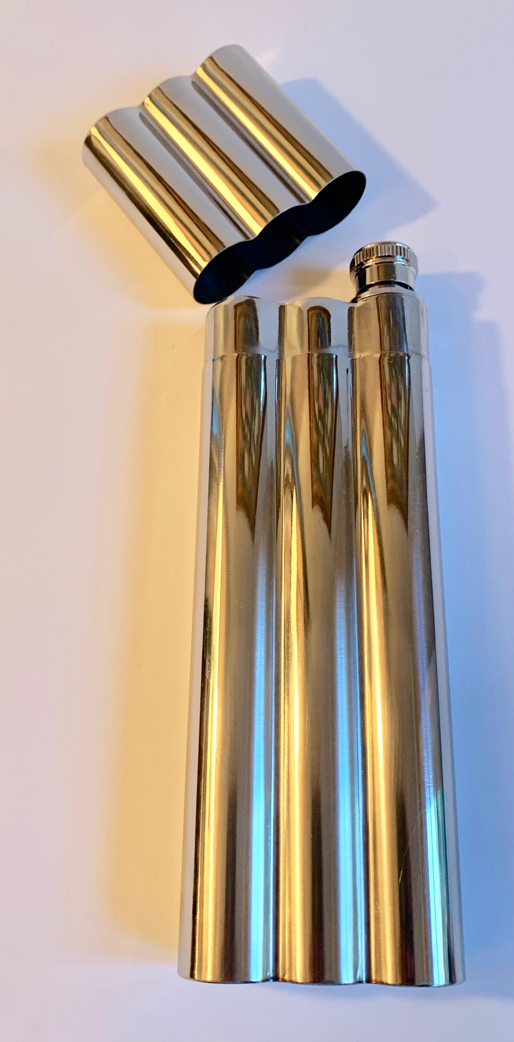 Polished chrome cigar holder with flask, this clever cigar holder will hold two cigars and your stash of favorite spirits, a great gift. Cigars, liquor, wine, 420.