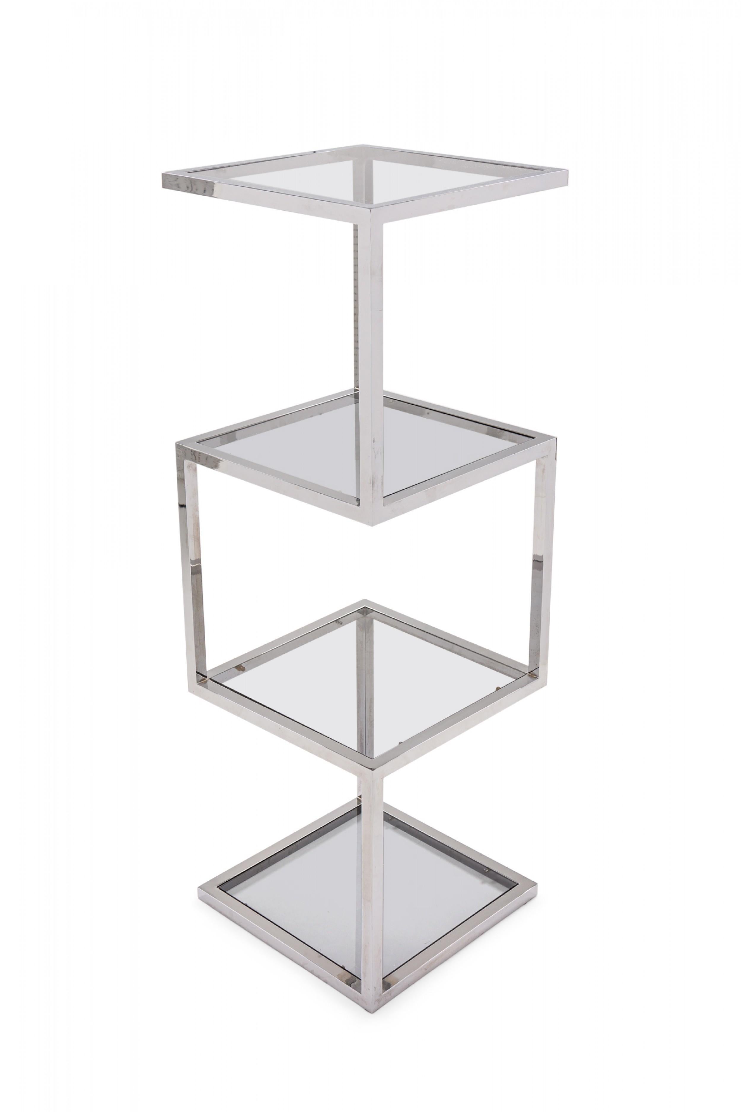 American Mid-Century Modern etagere / display shelf with a geometric form polished chrome plated steel frame and square smoked glass shelves.