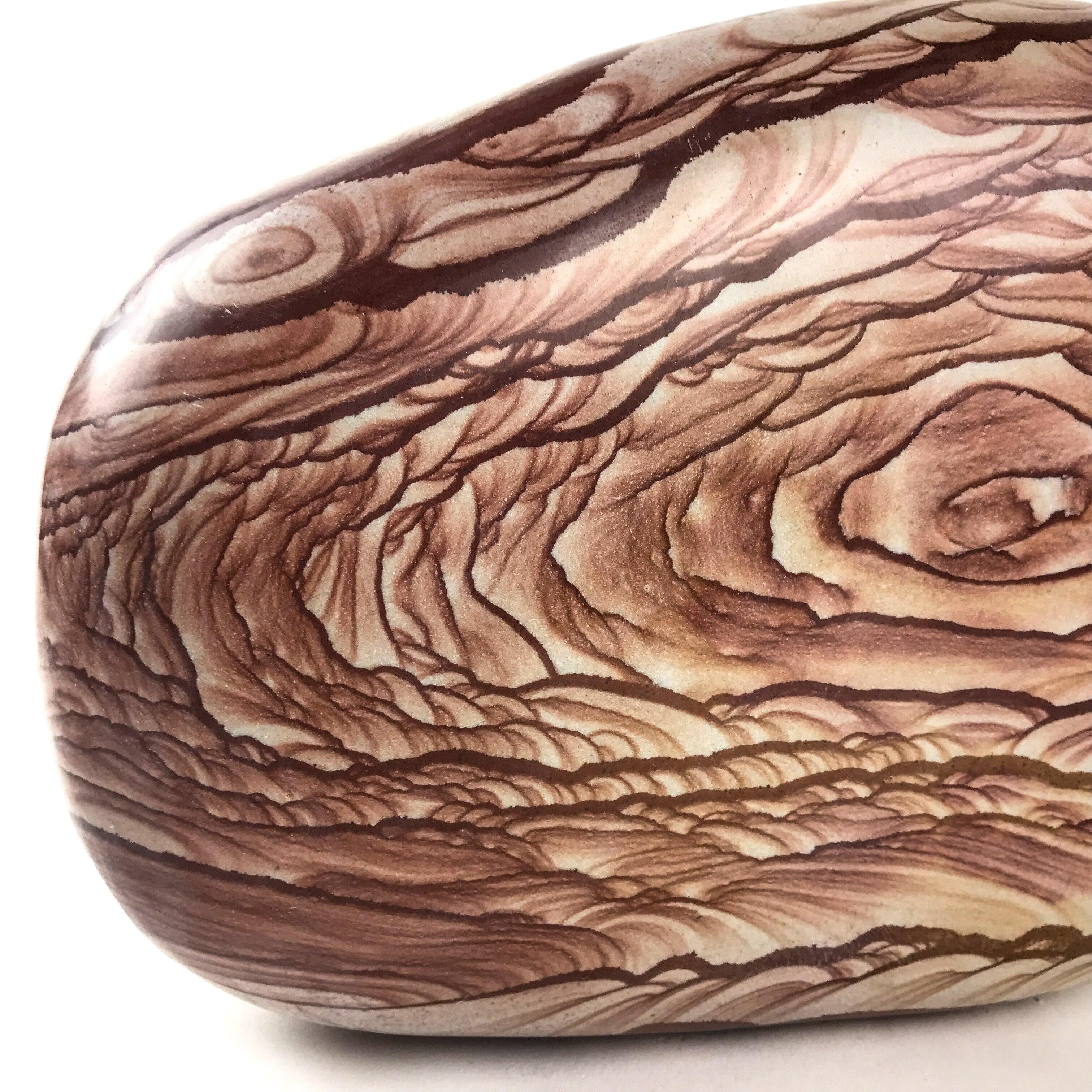 The Gimbae stone is from the ancient land of Pinggu - also known as the land of wonders. This piece of highly-polished Gimbae has a beautiful even pattern that flows throughout. 
Gimbae stone is from the original stone formation in the Sinian more