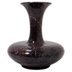 Polished granite vase
