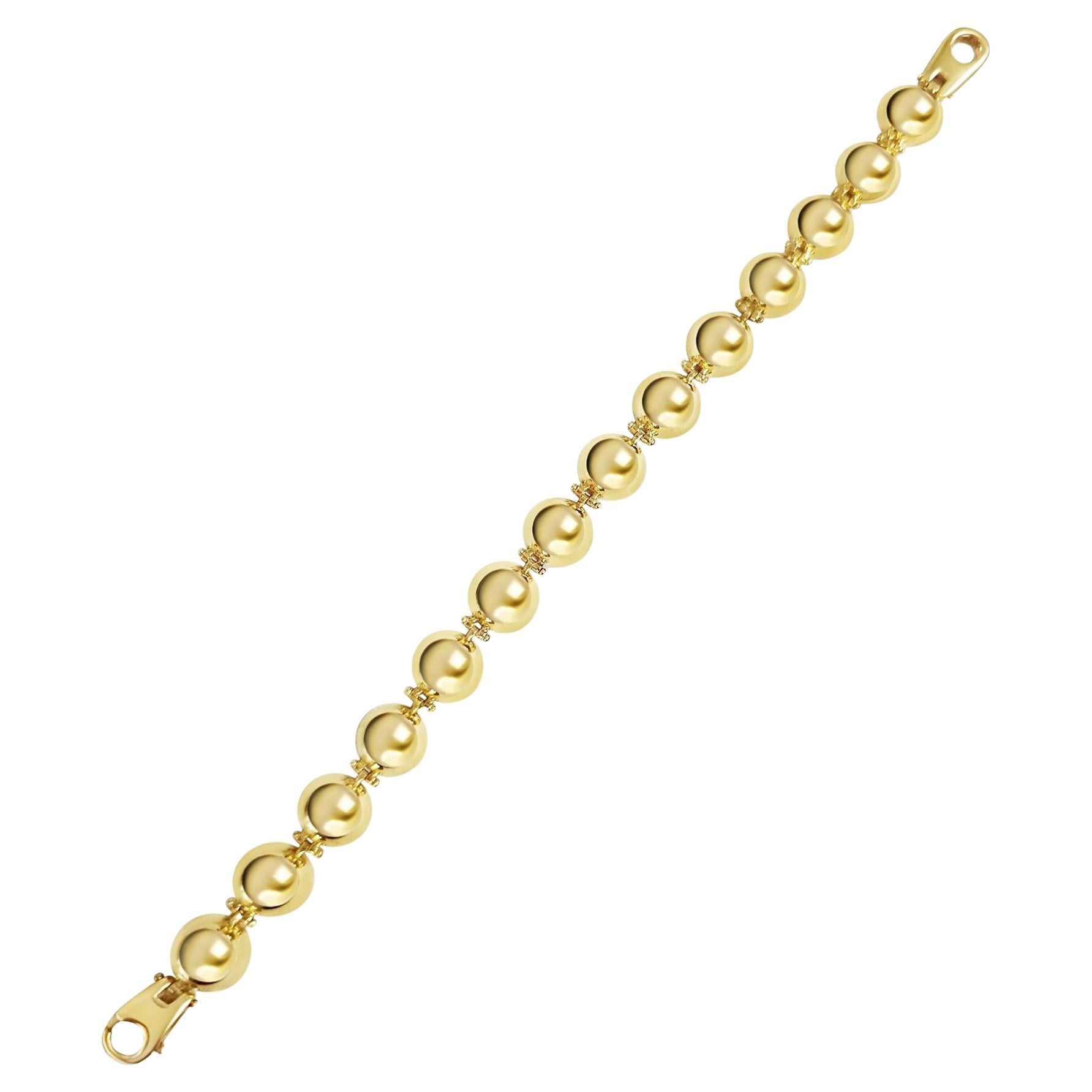 Bracciale con mezza sfera lucida in oro giallo 14k
