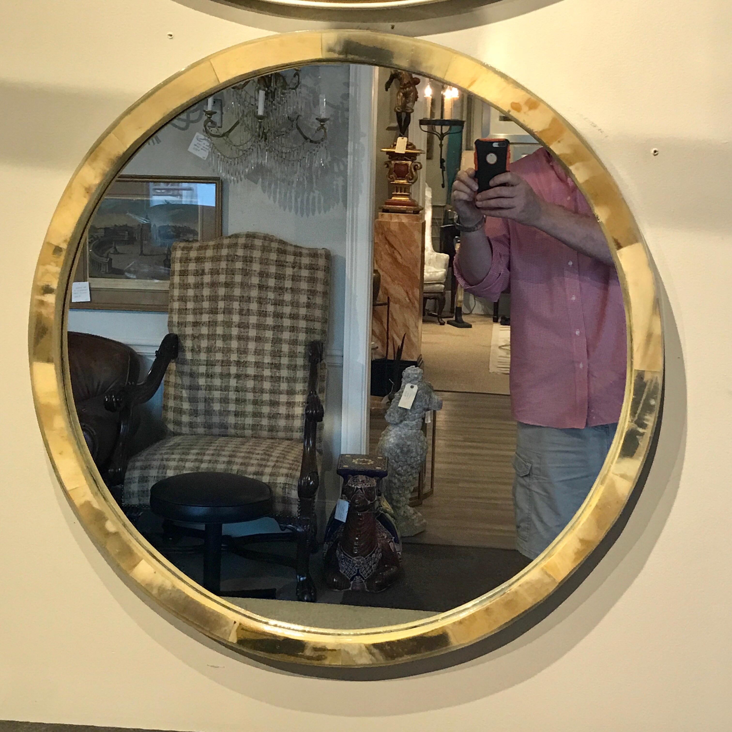 Polished horn circular wall mirror, with a 1.5