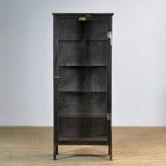 Polished iron medical cabinet, 1910s