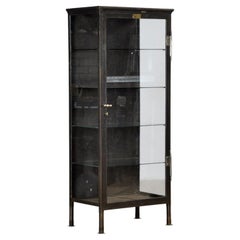 Polished iron medical cabinet, 1910s