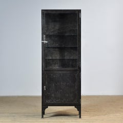 Polished iron medical cabinet, 1930s