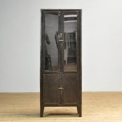 Polished iron medical cabinet, 1930s