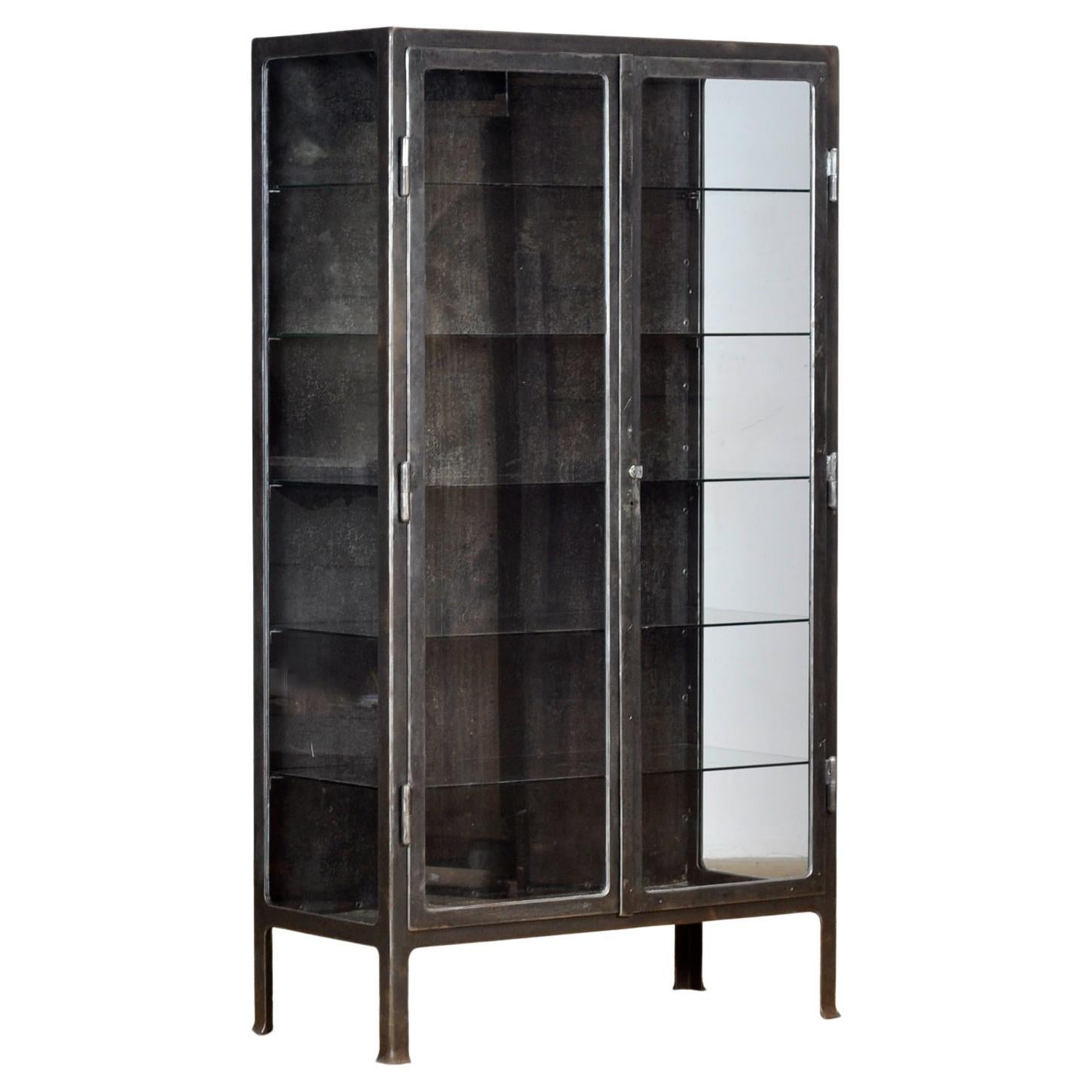 Polished iron medical cabinet, 1930s For Sale