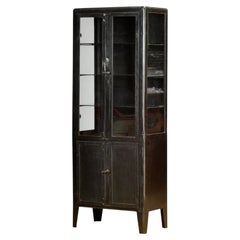 Polished iron medical cabinet, 1930s